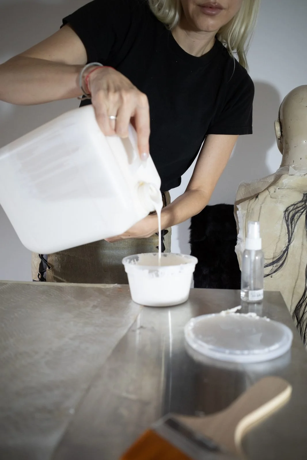 Janine Grosche working with natural liquid latex during the development of PATH’s translucent latex skins