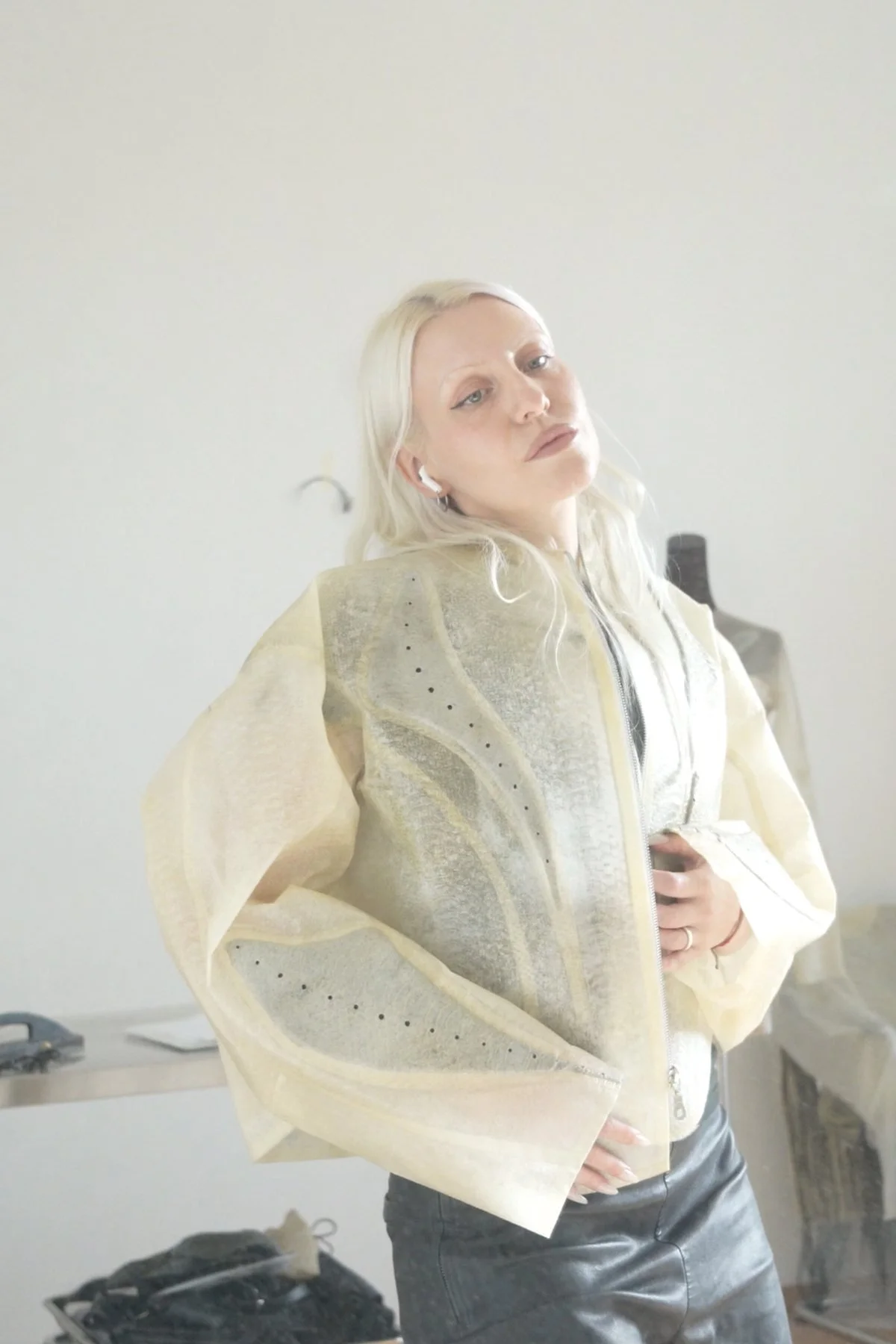 Janine Grosche wearing a reconstructed archival PATH piece developed for the Nike × Zalando collaboration, handcrafted in translucent natural latex