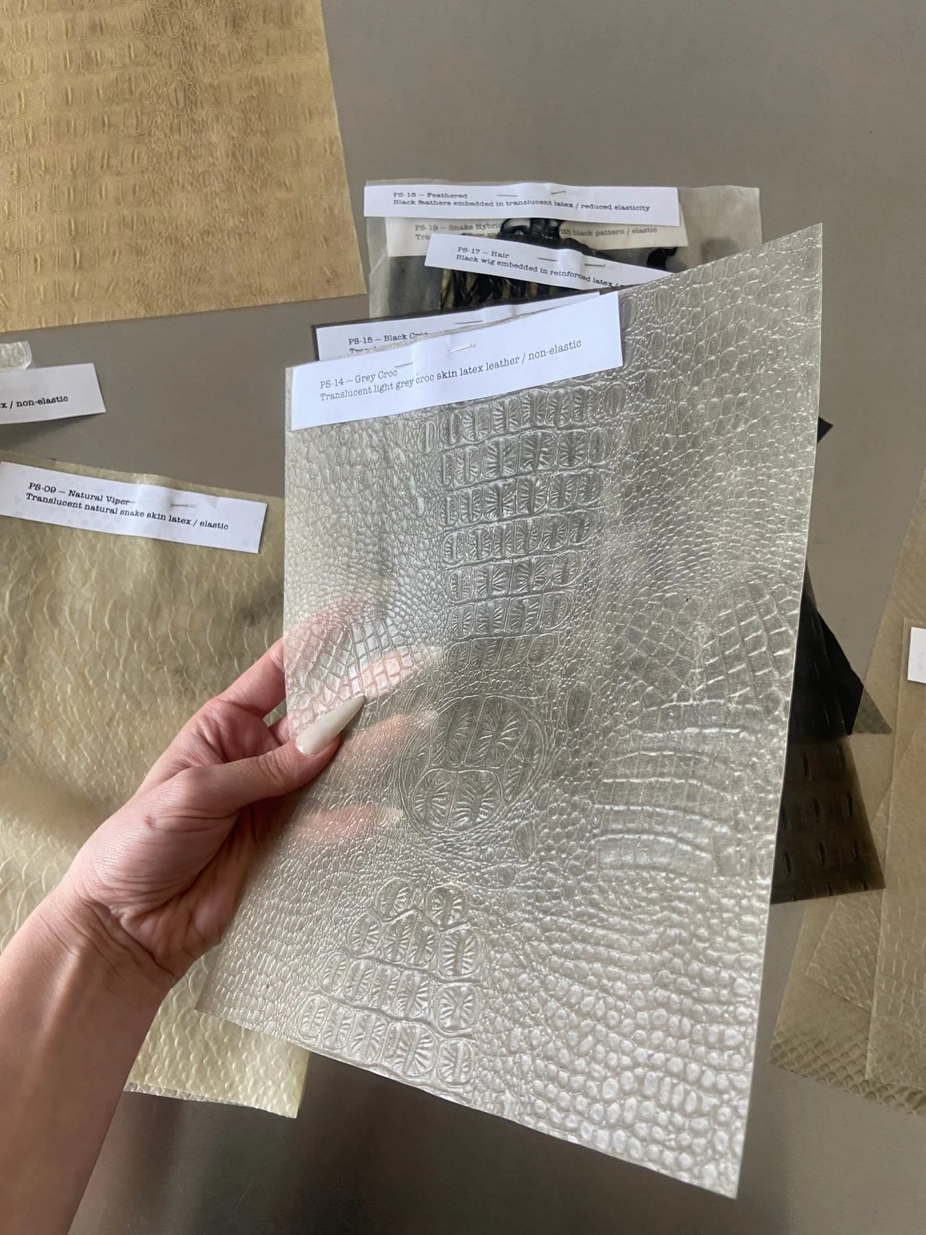 Translucent snake skin and croc latex material samples developed from natural liquid latex by Janine Grosche / PATH