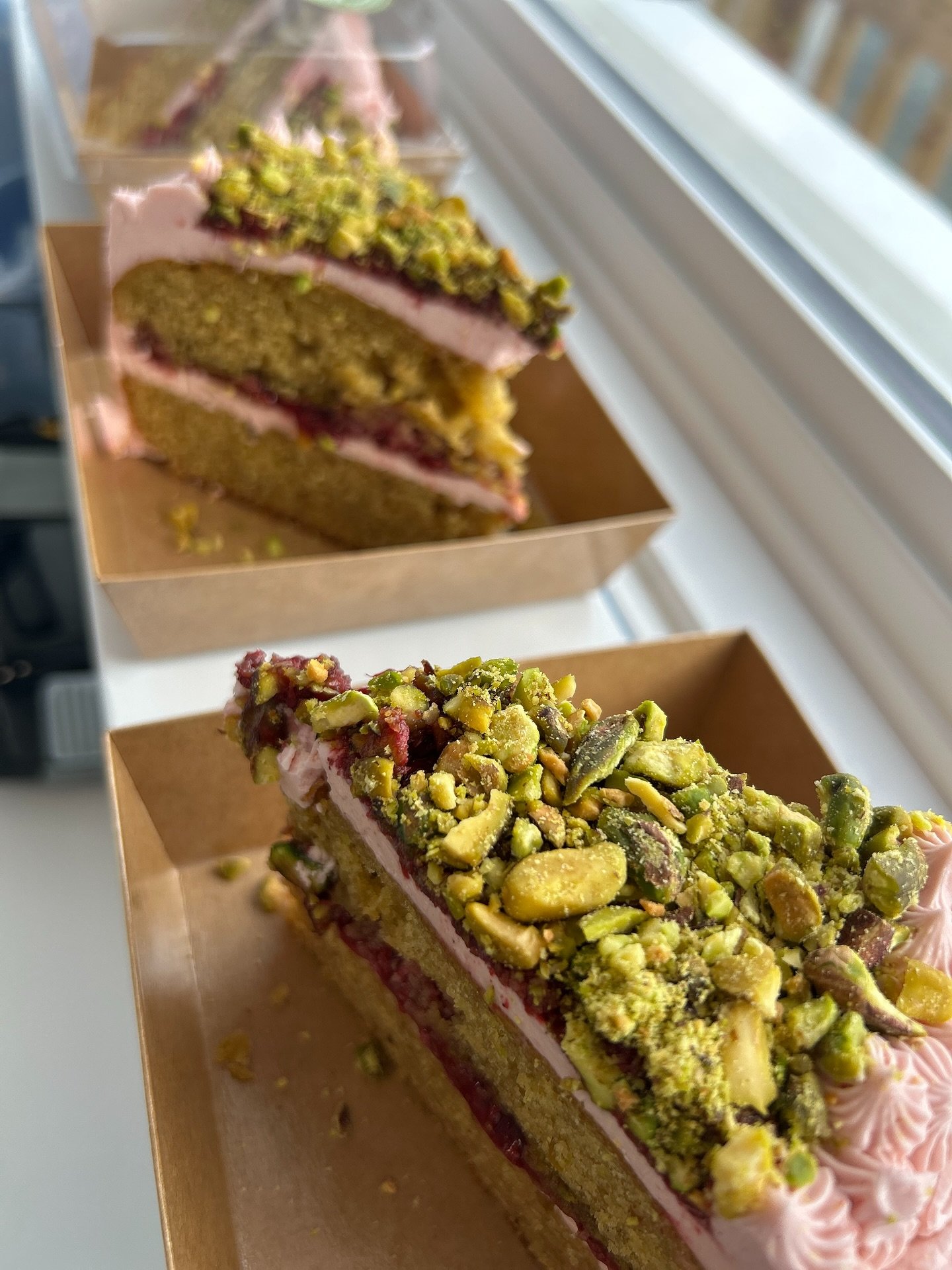 We will be open this Thursday, June 26th, from 12pm to 7pm at 11186 Peggy&rsquo;s Cove Rd.
We are delighted to offer our Gluten Free Raspberry Pistachio Cake&mdash;a delicate and delicious creation that beautifully blends tart raspberries with the ri