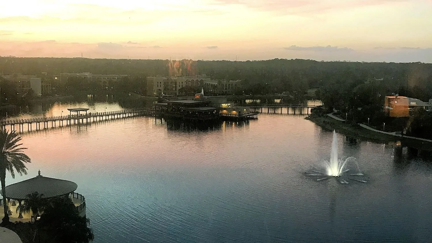 A view from the Coronado Springs tower over the lake, showing other parts of the villages and three bridges restaurant.