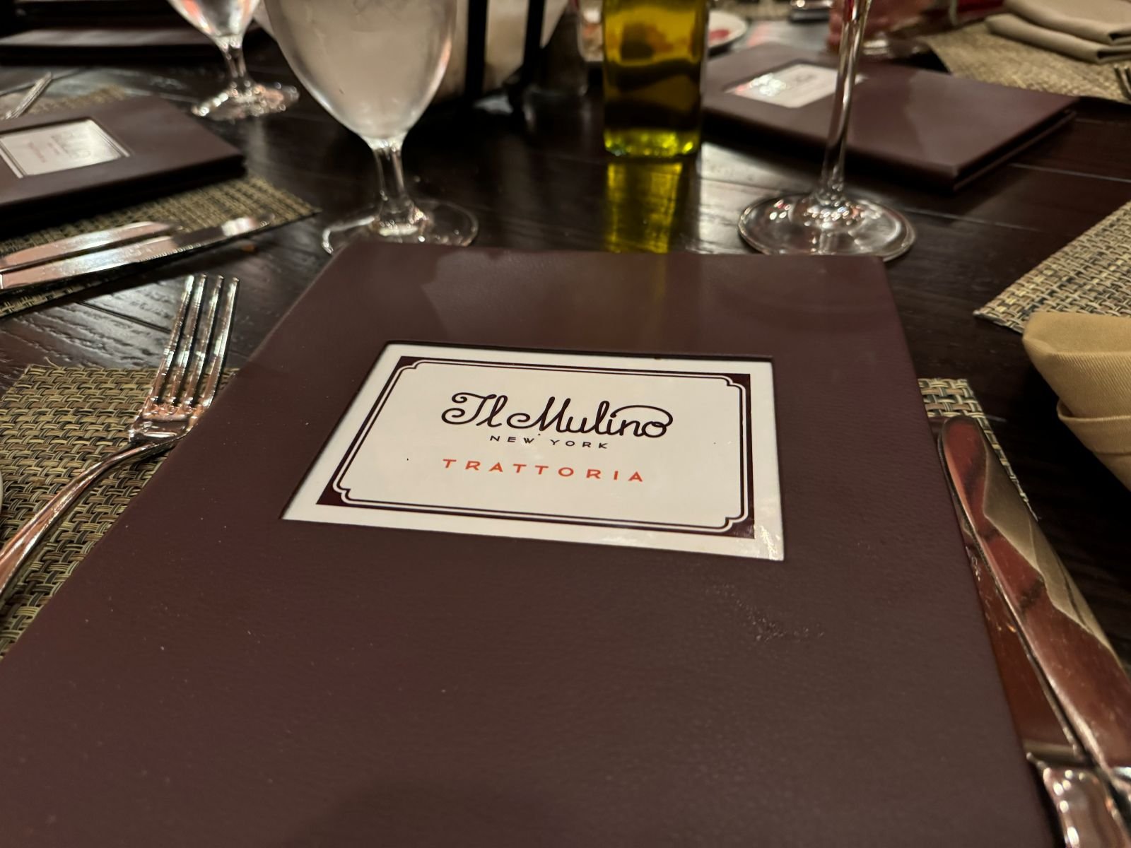 A photograph of the menu at Il Mulino, an Itlalian restaurant in The Swan hotel at Disney World near the Boardwalk area.