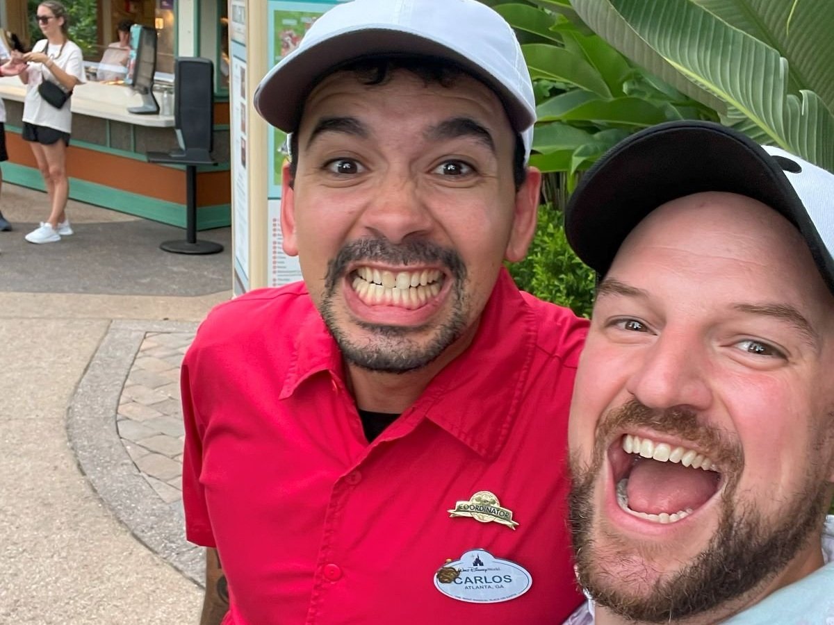 Me taking a photo with a cast member who's a close friend during the food and wine festival at Epcot at Disney before the after hours event.