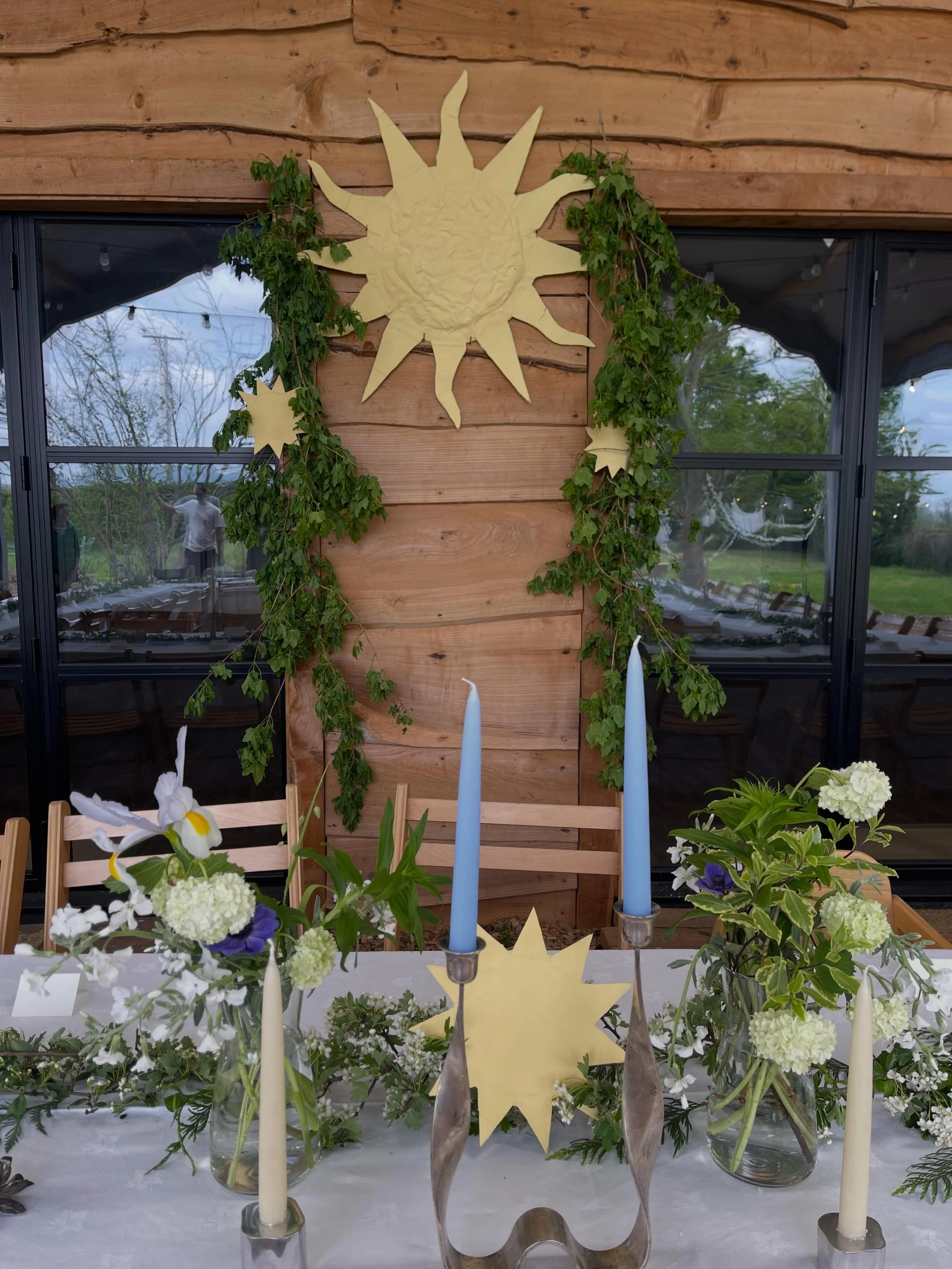 Last weekend we had a wedding in the field. Not something we usually do but this was for a very special friend.
They made the barn look so gorgeous with lots of foraged foliage and hand made decorations and beautiful candles.
The sun is a bit like ou