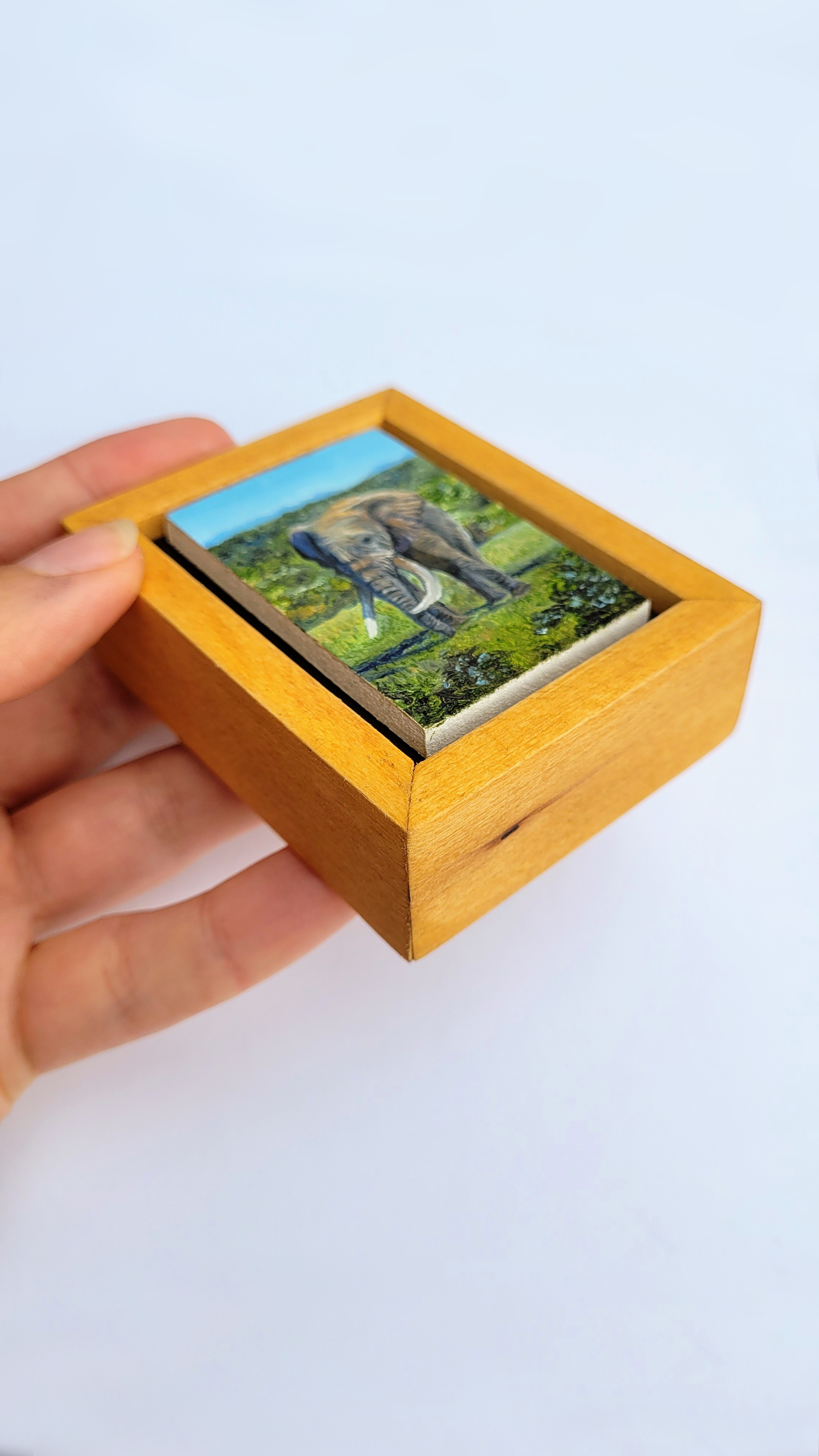 holding-framed-elephant-mini.png