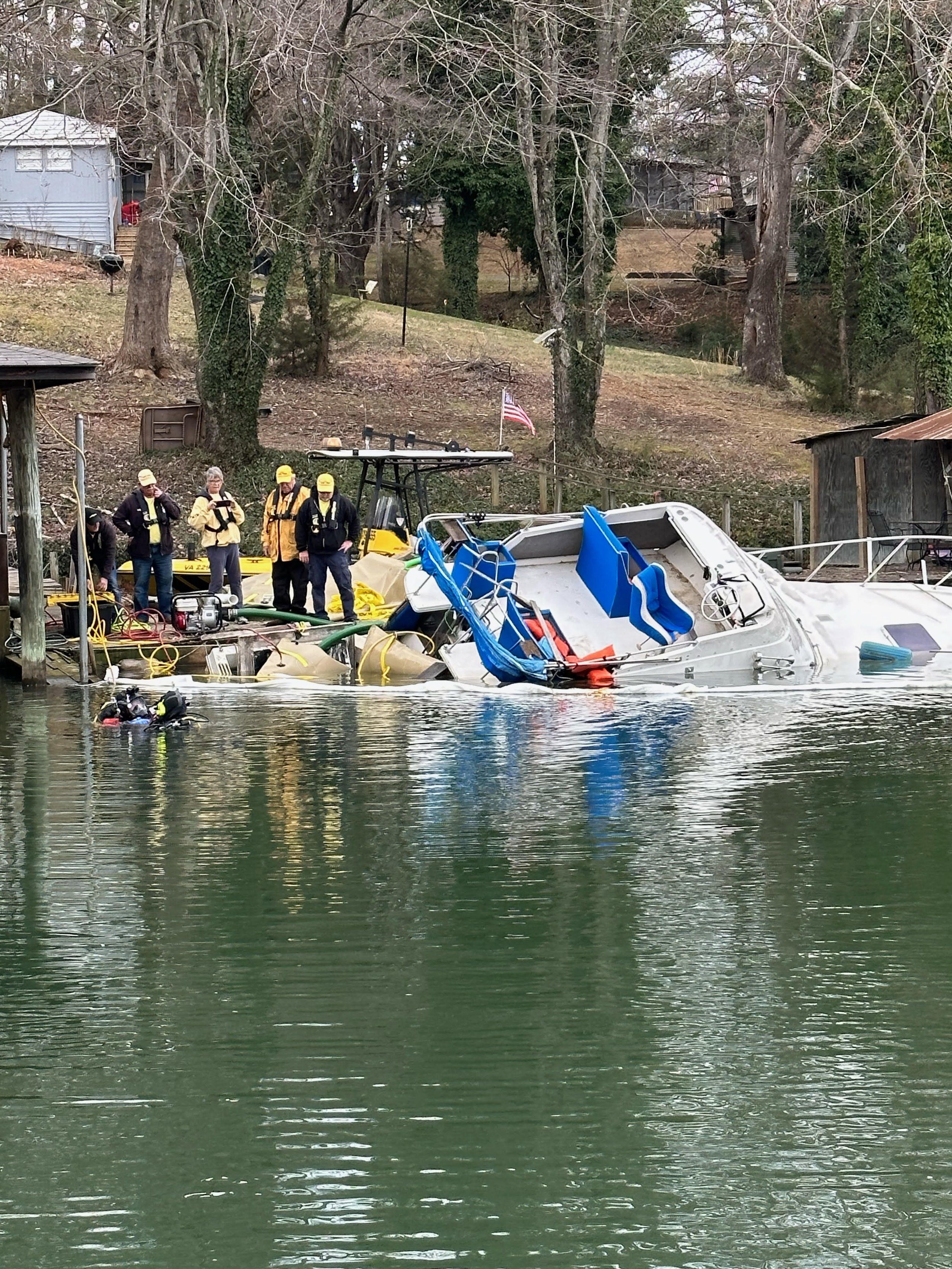 Surface crew communicating with divers in the water.jpeg