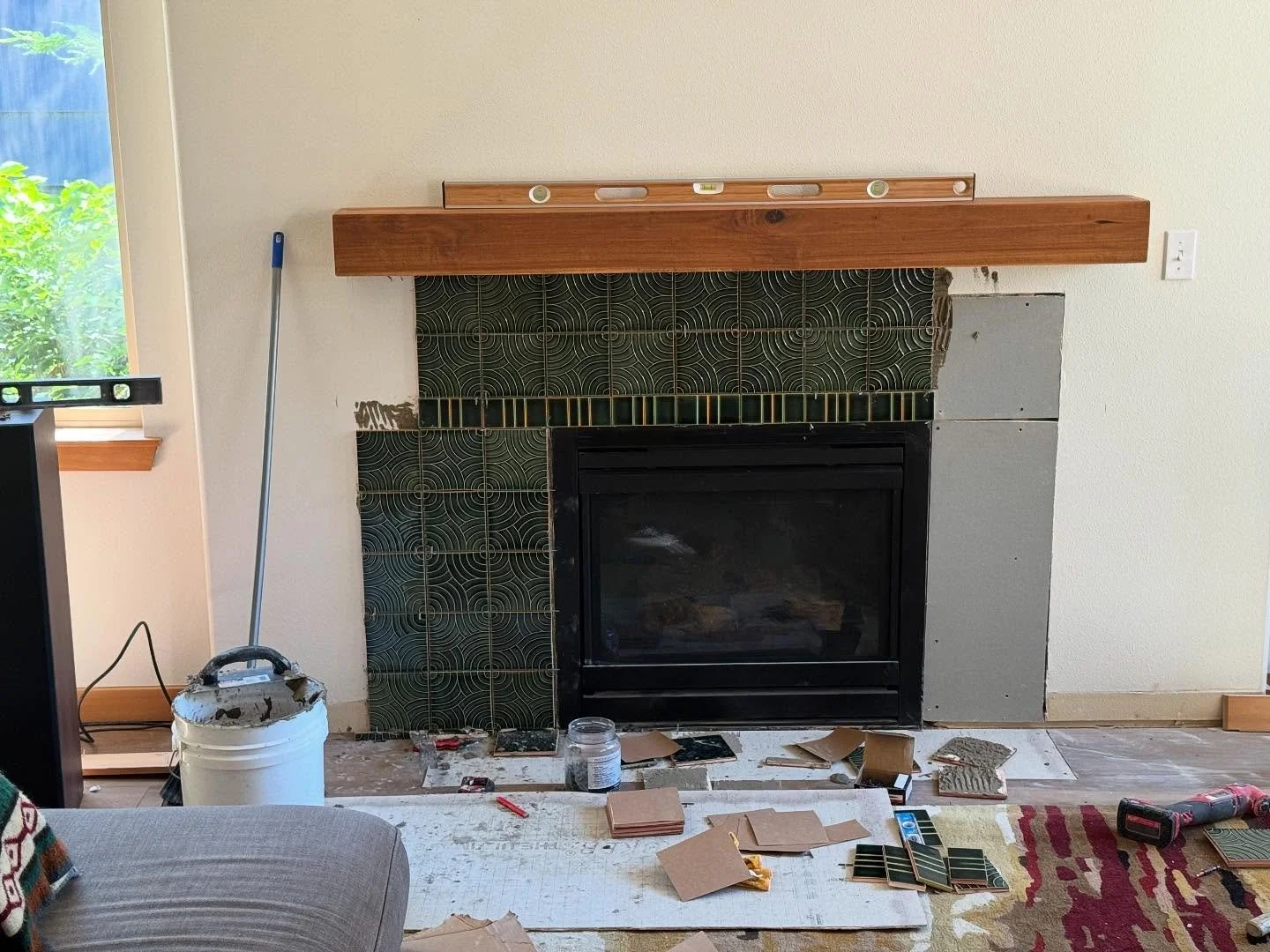 Phew, this fireplace is getting a much needed upgrade with these gorgeous glazed tiles!