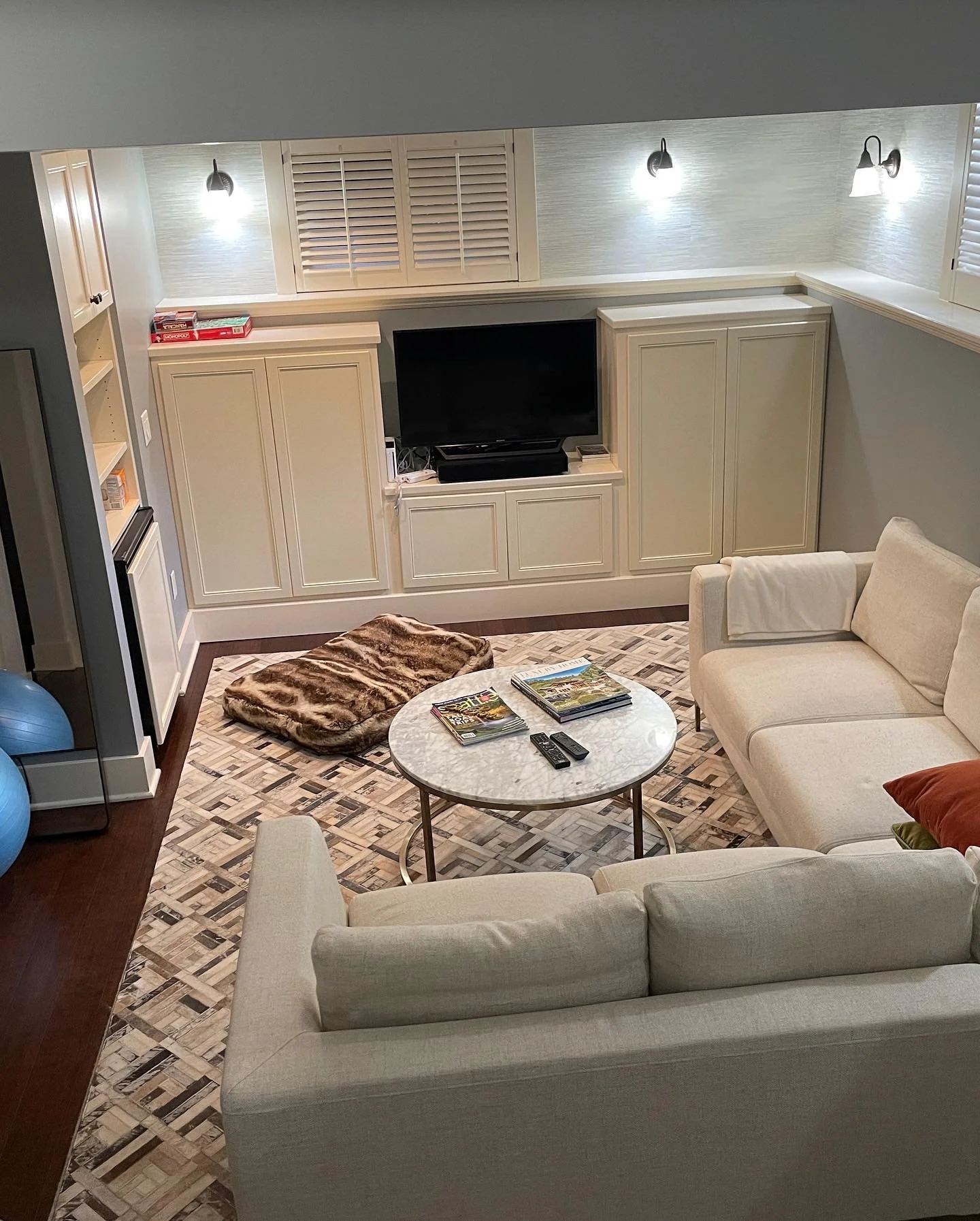 Before and after! Back to our Seattle Tudor&hellip;we also refreshed the family room. Furnishings got an update, but most importantly, those updated sconces bring soft warmth and a touch of elegance to the space.