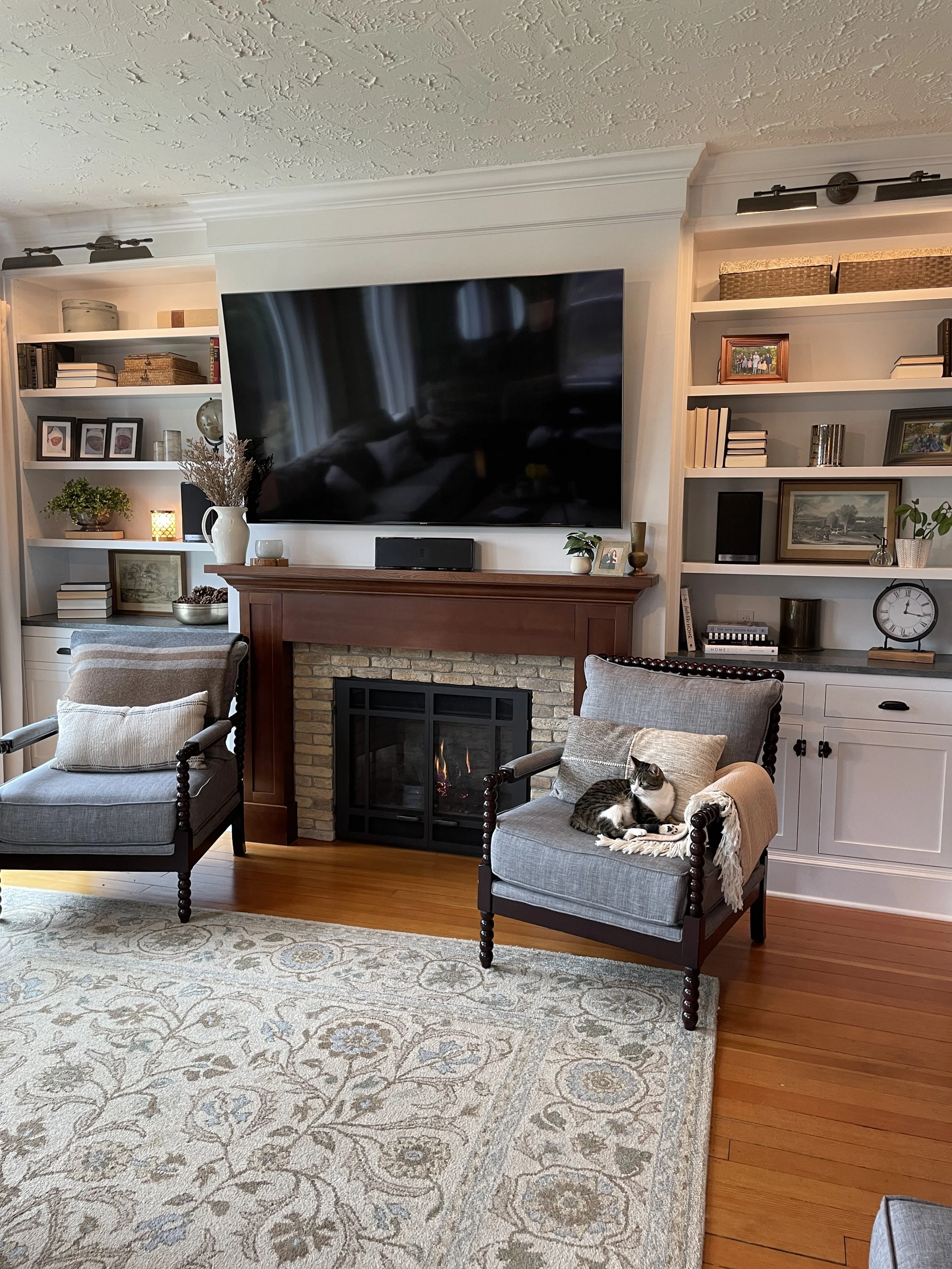 Added a fireplace and beautiful cabinetry for this custom look