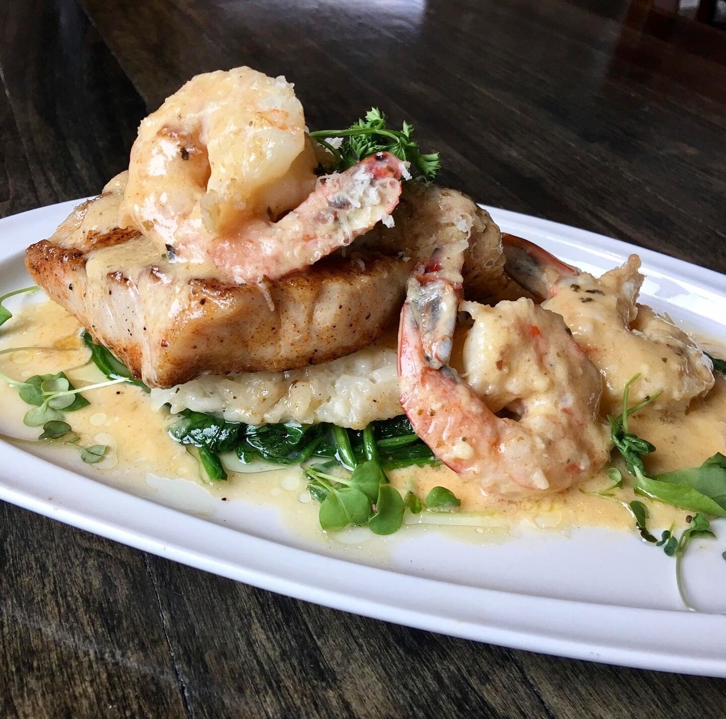 Looking for a delicious seafood dish to indulge in today for #FishFriday? We&rsquo;ve got you covered! 🌊

📸 &ldquo;Rack House Style&rdquo; Fish of the Day | Ask your server for today&rsquo;s selection. Served over a bed of saut&eacute;ed spinach an