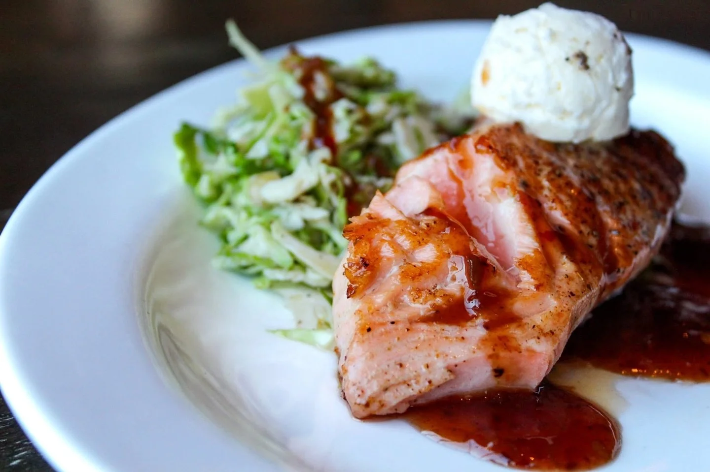 Meet your new favorite: Hot Honey Faroe Island Salmon &mdash; seared medium, shaved Brussels in citrus champagne vinaigrette, finished with house-made honey. ✨