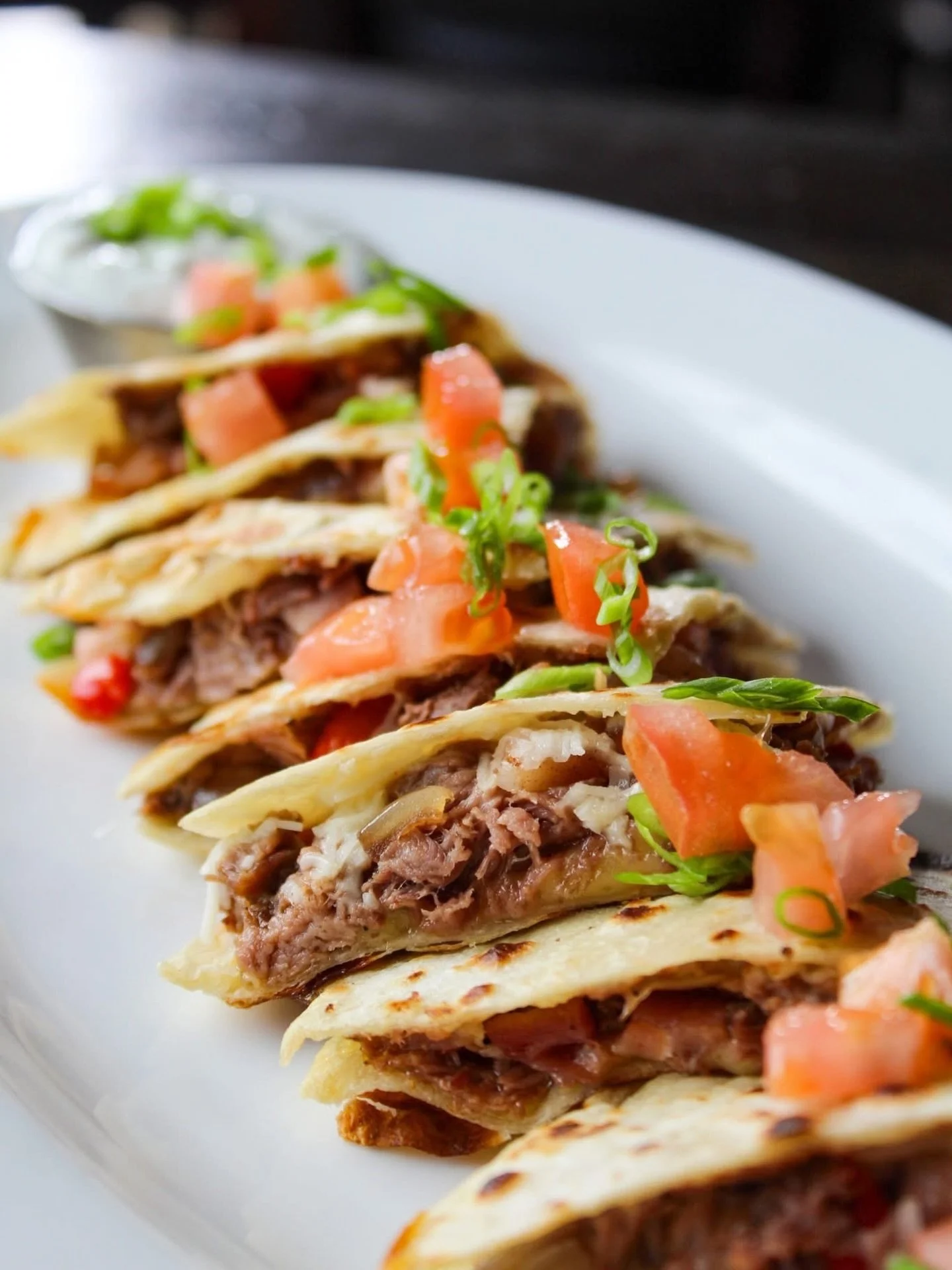 Not your average quesadilla.
Duck. Tasso. Melty cheeses. Roasted peppers. Grilled Onions. What more could you ask for?

🍴 Learn more at rackhousesteaks.com/featured-menu