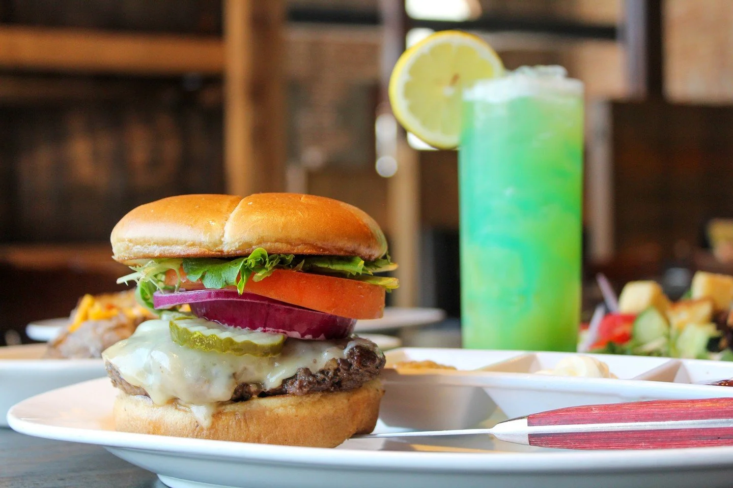 Our Filet &amp; Ribeye Burger starts with filet tenderloin and ribeye, ground in-house with rosemary, then topped with Parmesan and Gruy&egrave;re and dressed to your liking!

Because if you&rsquo;re celebrating National Cheeseburger Day, you might a