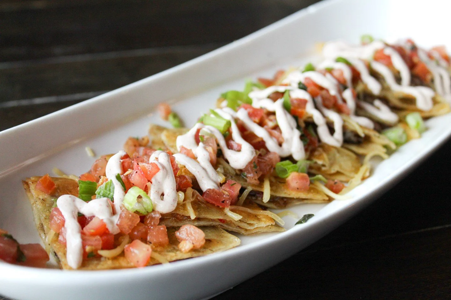 Your reminder to start with the quesadilla. 😉

Our featured Short Rib Quesadilla is loaded with tender slow-cooked short rib, roasted red peppers, grilled onions &amp; smoked Gouda, then grilled golden and finished with our steakhouse sour cream, ch