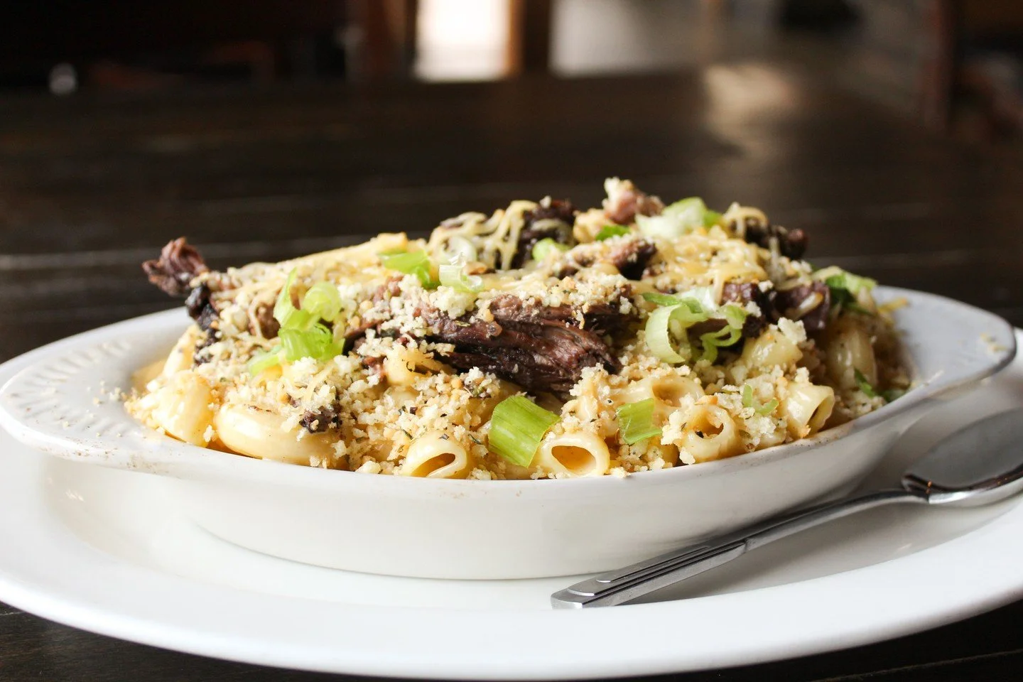 Smoked Gouda mac. Slow-cooked short rib. Toasted Parmesan panko. It's what's for dinner tonight. 🍂

🔗 View our fall features, reserve your table, join our loyalty program, &amp; more at rackhousesteaks.com.