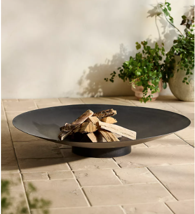 Sleek and understated with a shallow bowl silhouette, this fire pit is constructed from weathering steel, a heat-resistant steel alloy that develops a stable, rust-like finish when exposed to the elements.