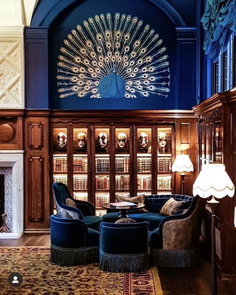 Luxury Library Lounge with Custom Woodwork and Statement Art