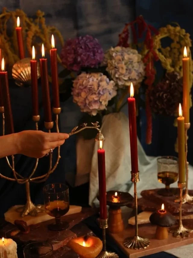 Luxury Candlelit Tablescape with Floral Arrangement and Brass Accents