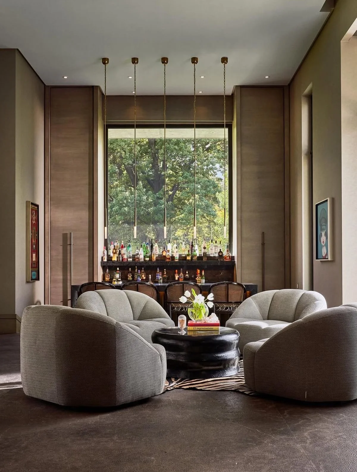 Modern Lounge Seating with Bar and Pendant Lighting