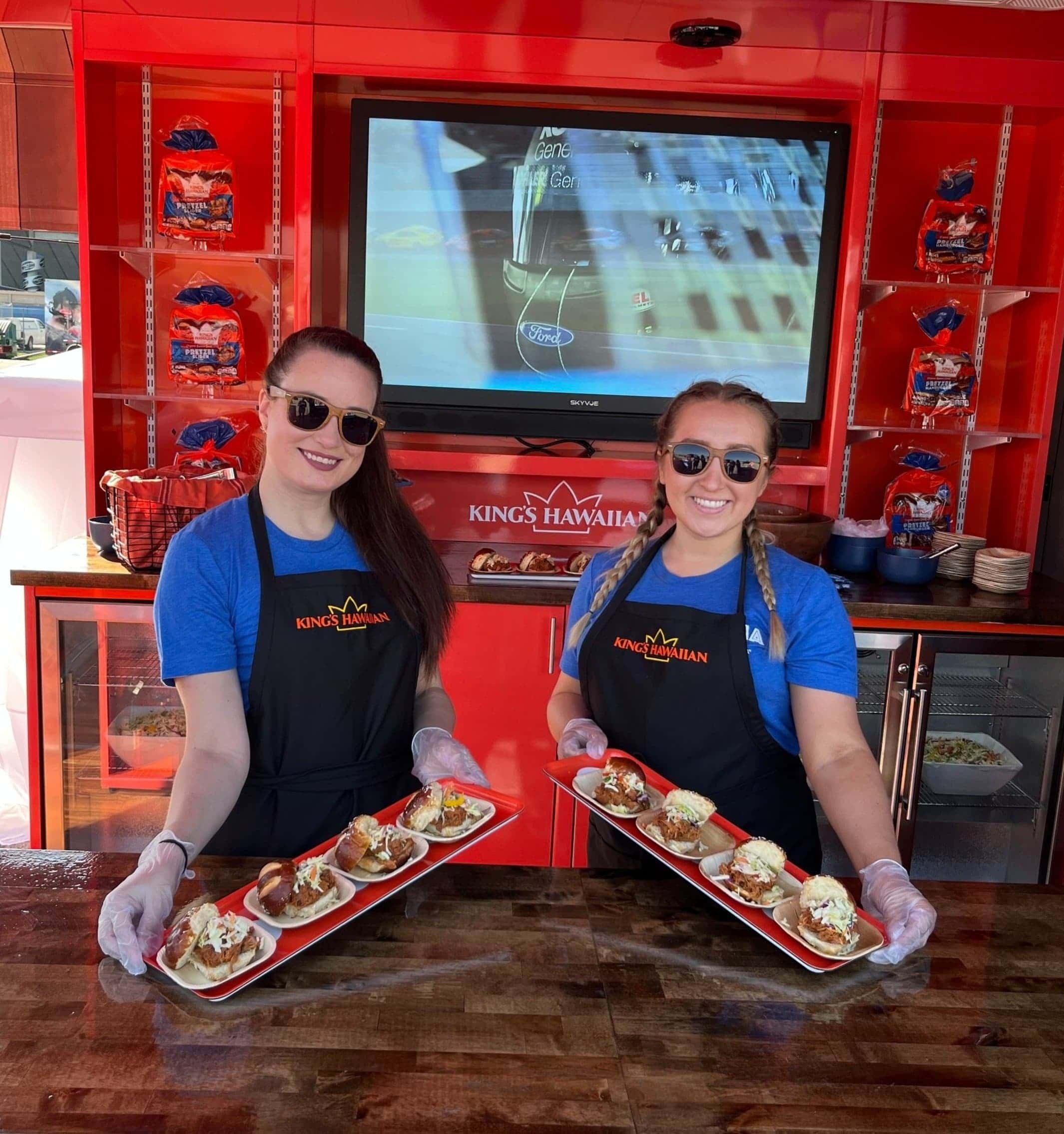 two girls holding products for Kings Hawaiian Event
