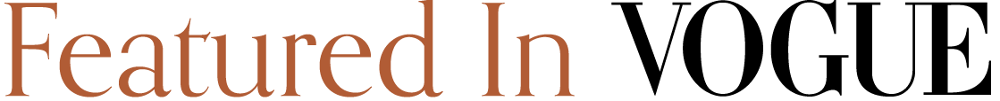 Text reading 'Featured In Vogue' in brown letters on a white background.