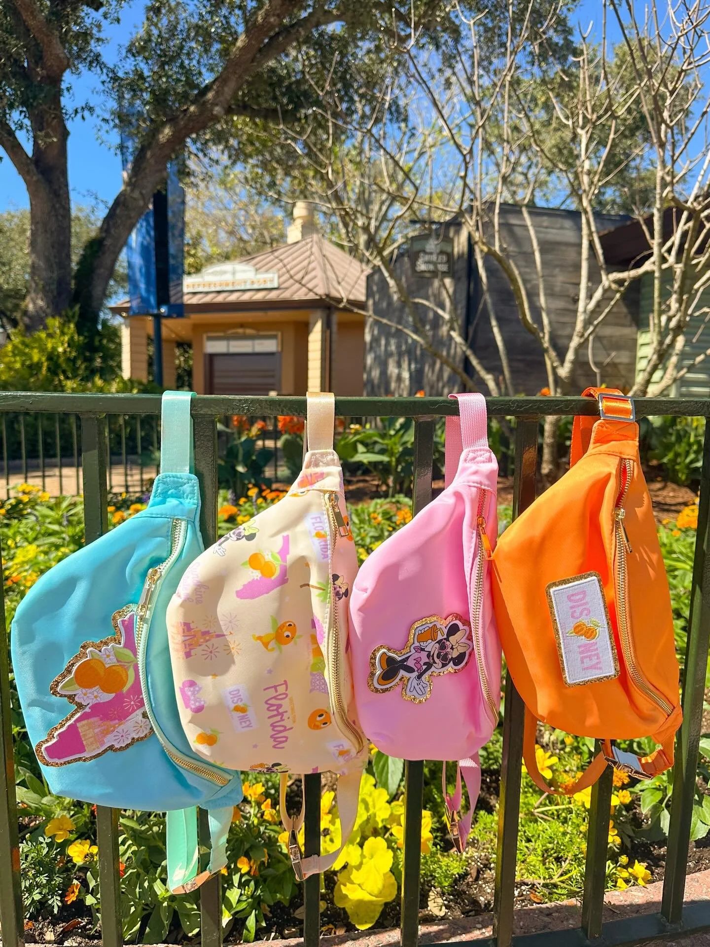 Florida!!! This collection is for you and it&rsquo;s live on our website now! Shop this new WDW Florida inspired print which comes in a fanny pack and cosmetic bag plus these coordinating patches and patches bags. Available now! 🍊🌸🌼
