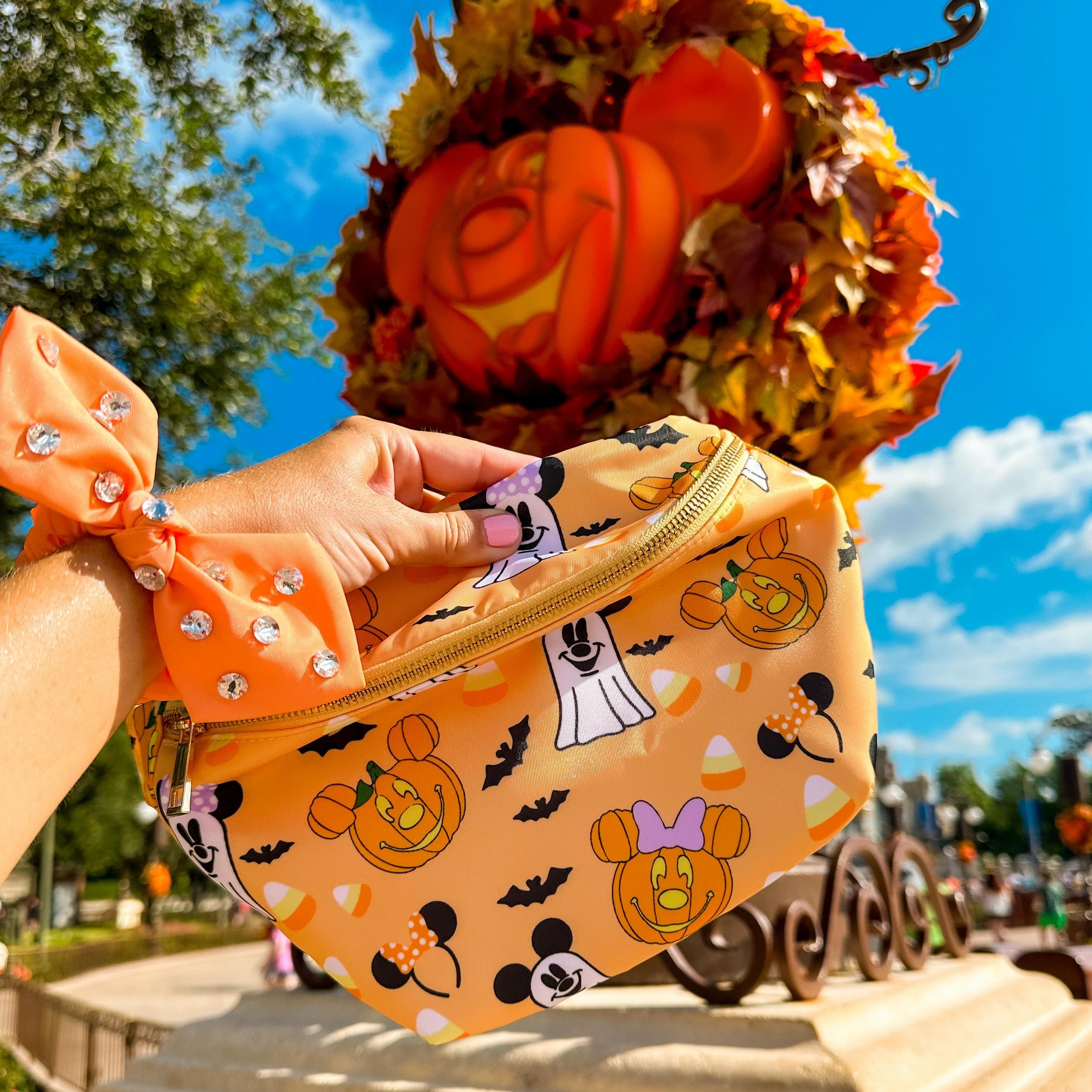 Pumpkins are out on Main Street! The most magical time of the year. 🎃 Shop our best selling Halloween print of all time, available now!