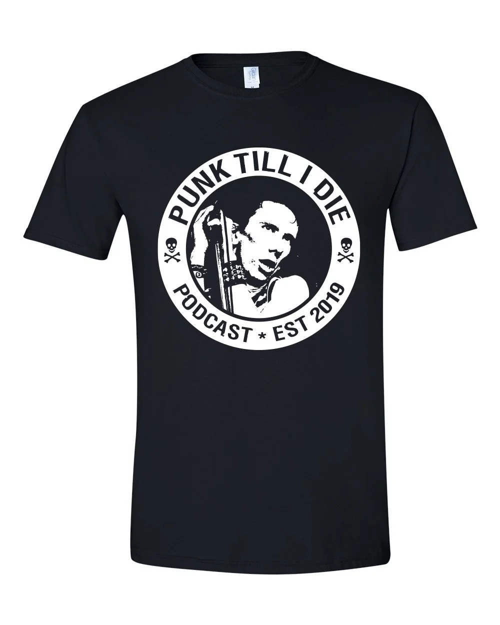 Black t-shirt with a graphic of a punk musician holding a microphone and a guitar, surrounded by text that reads 'Punk Till I Die,' 'Podcast,' and 'Est 2019,' with skull symbols on each side of the circle.