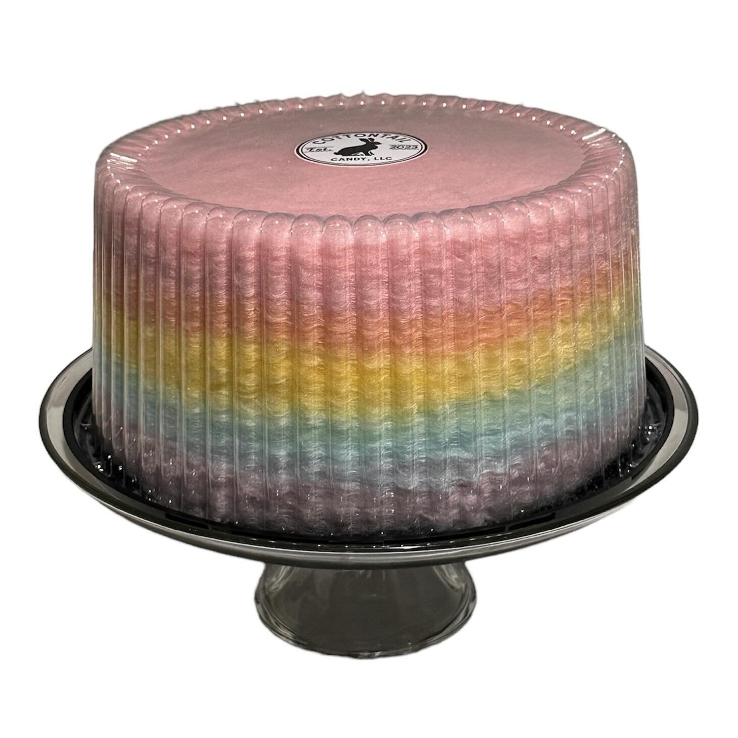 Another rainbow cake ready for a birthday! This cake is packed full of fluffy deliciousness! Layers are strawberry, orange, banana, lime, blue raspberry, and grape. Yum!