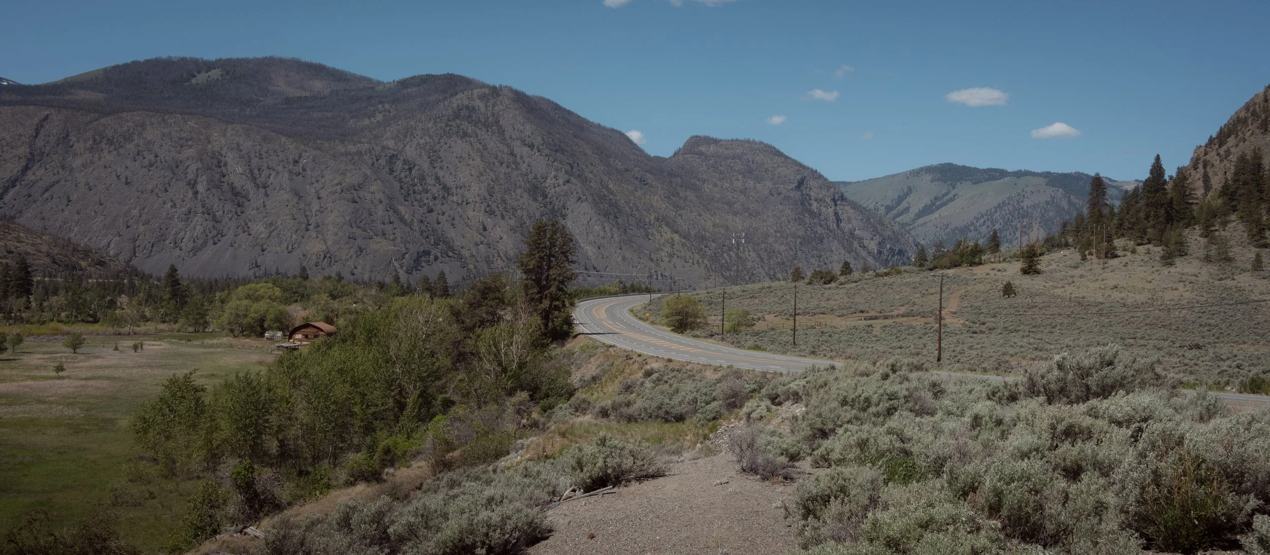 This album started with a road shot, so let's close it with another road shot: the Crowsnest Highway winding through sagebrush-covered slopes. 