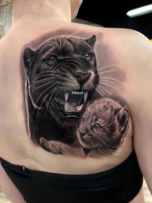 Realistic black and grey panther and cub. Edmonton tattoo artist