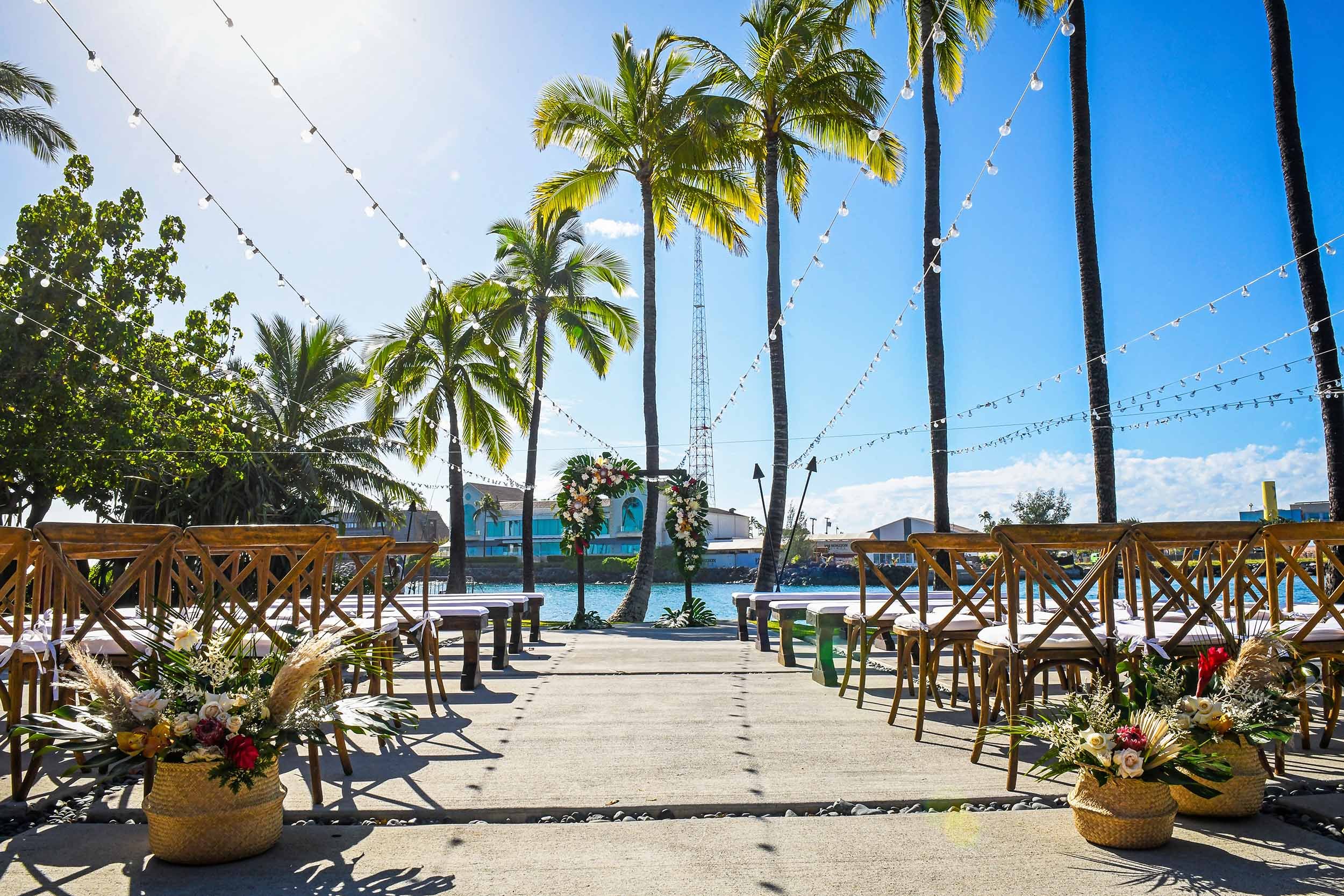 Wedding aisle setup at Ho'okupu Center facing the Kewalo Basin channel.