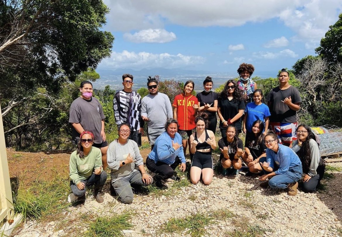 Participants of the Hawaii Youth Sustainability Challenge smiling for a group photo.