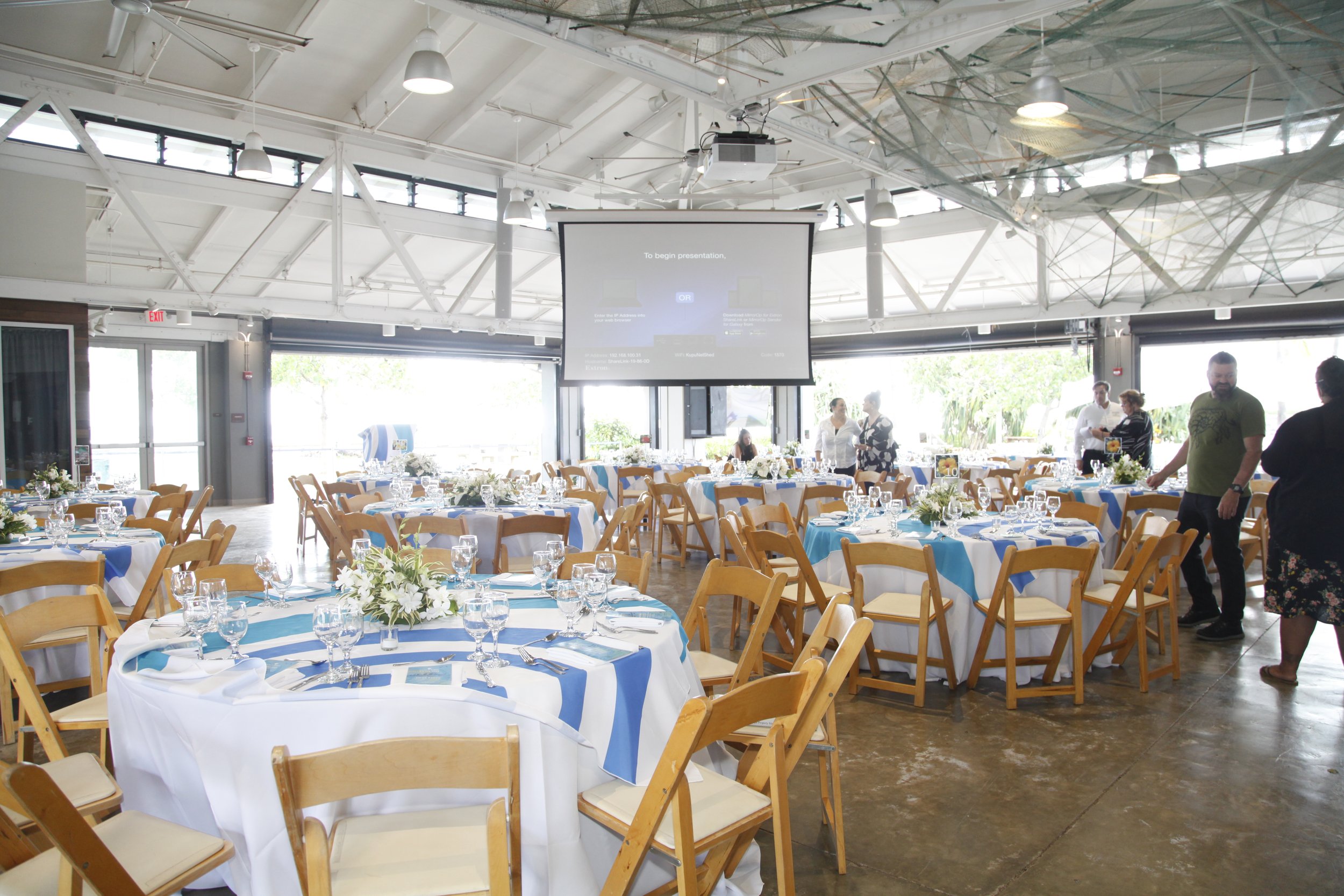 Indoor formal event setup at Ho'okupu Center.