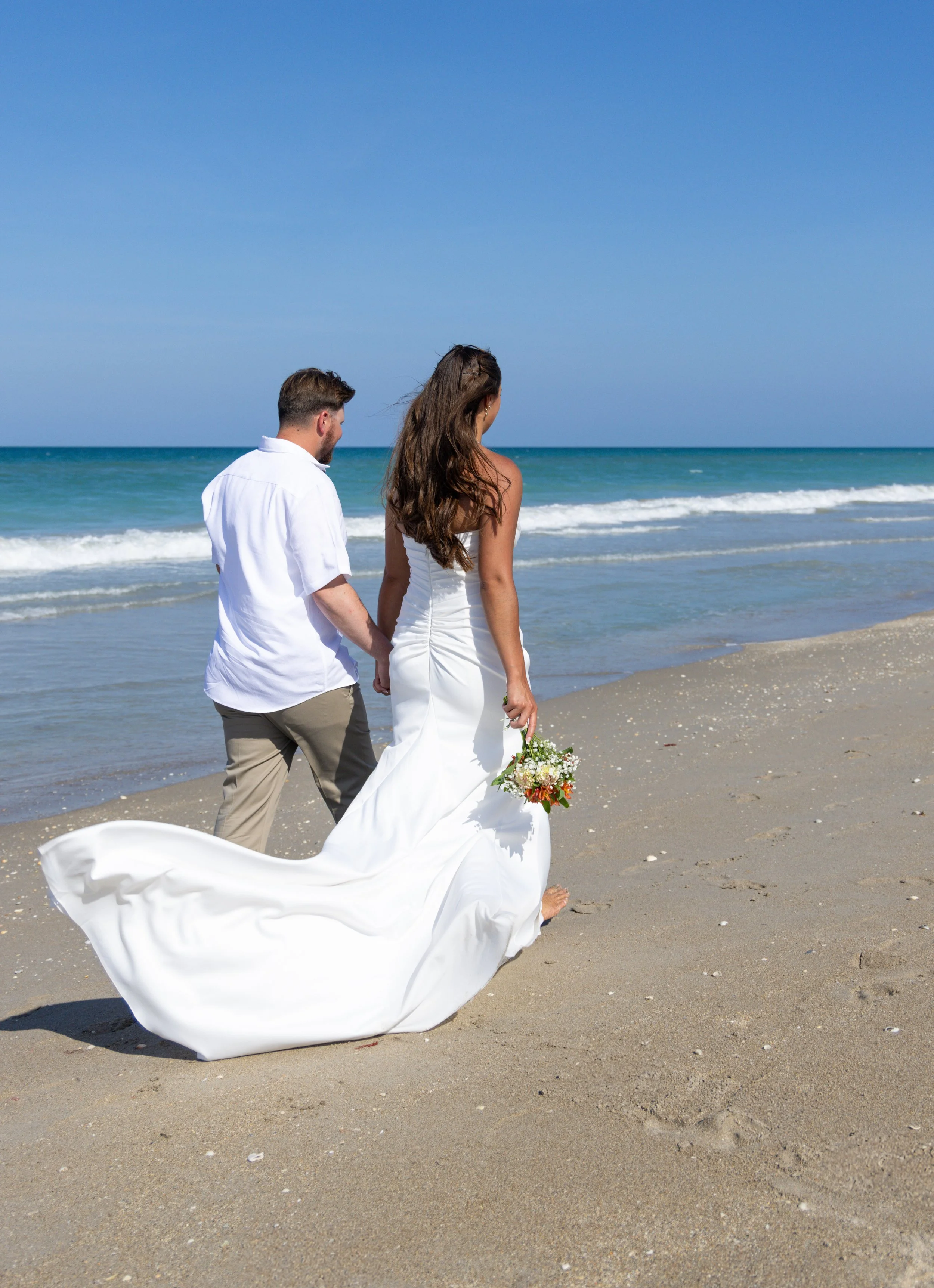 Beach wedding portraits captured on Florida's Treasure Coast. 