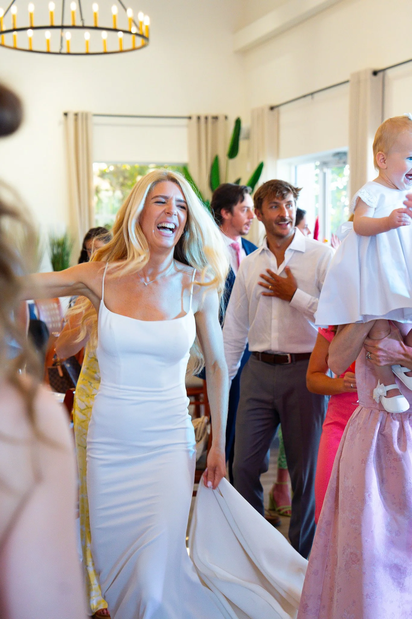 Wedding reception celebration captured in a documentary photography style. 