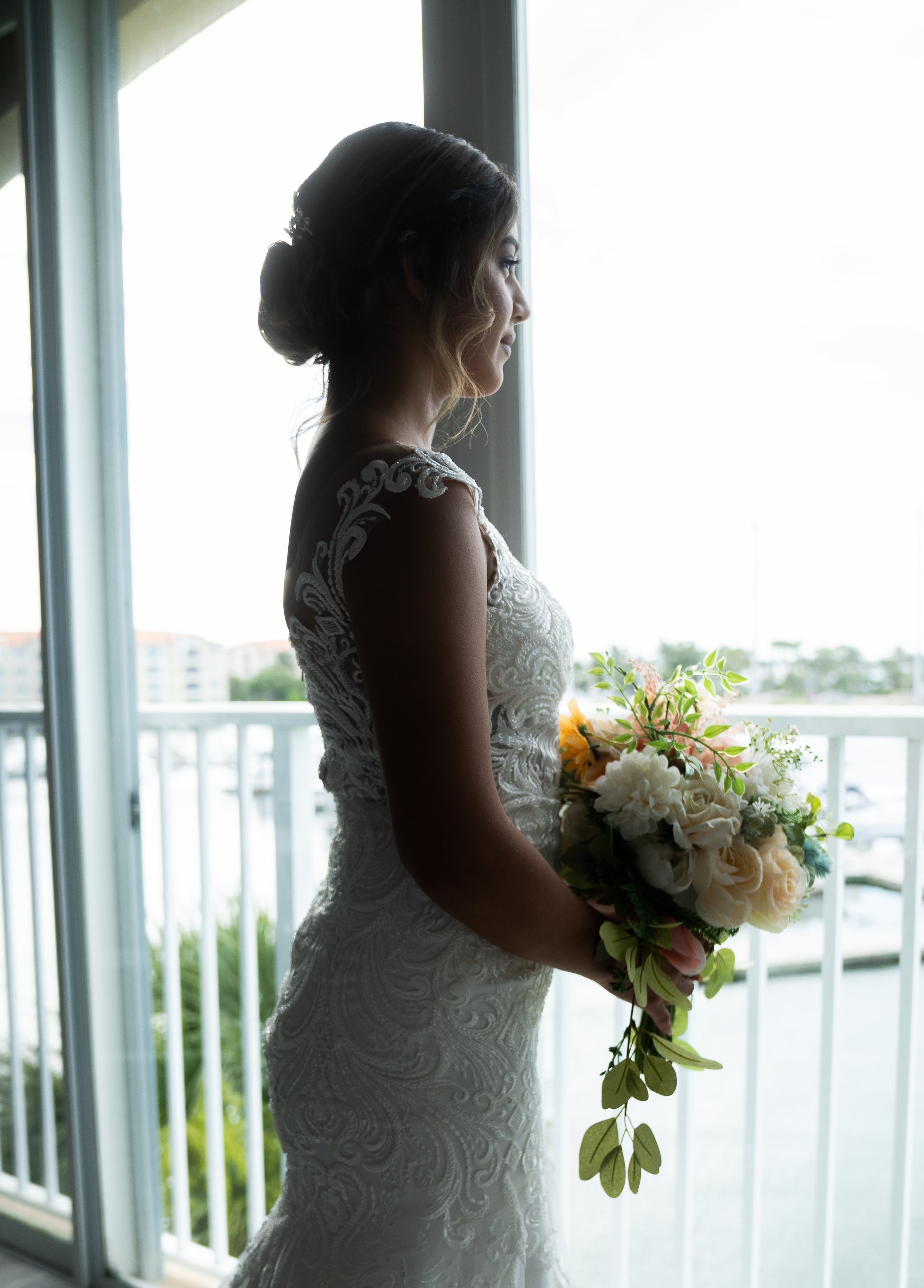 Framed in natural light, her figure glows in the stillness of morning