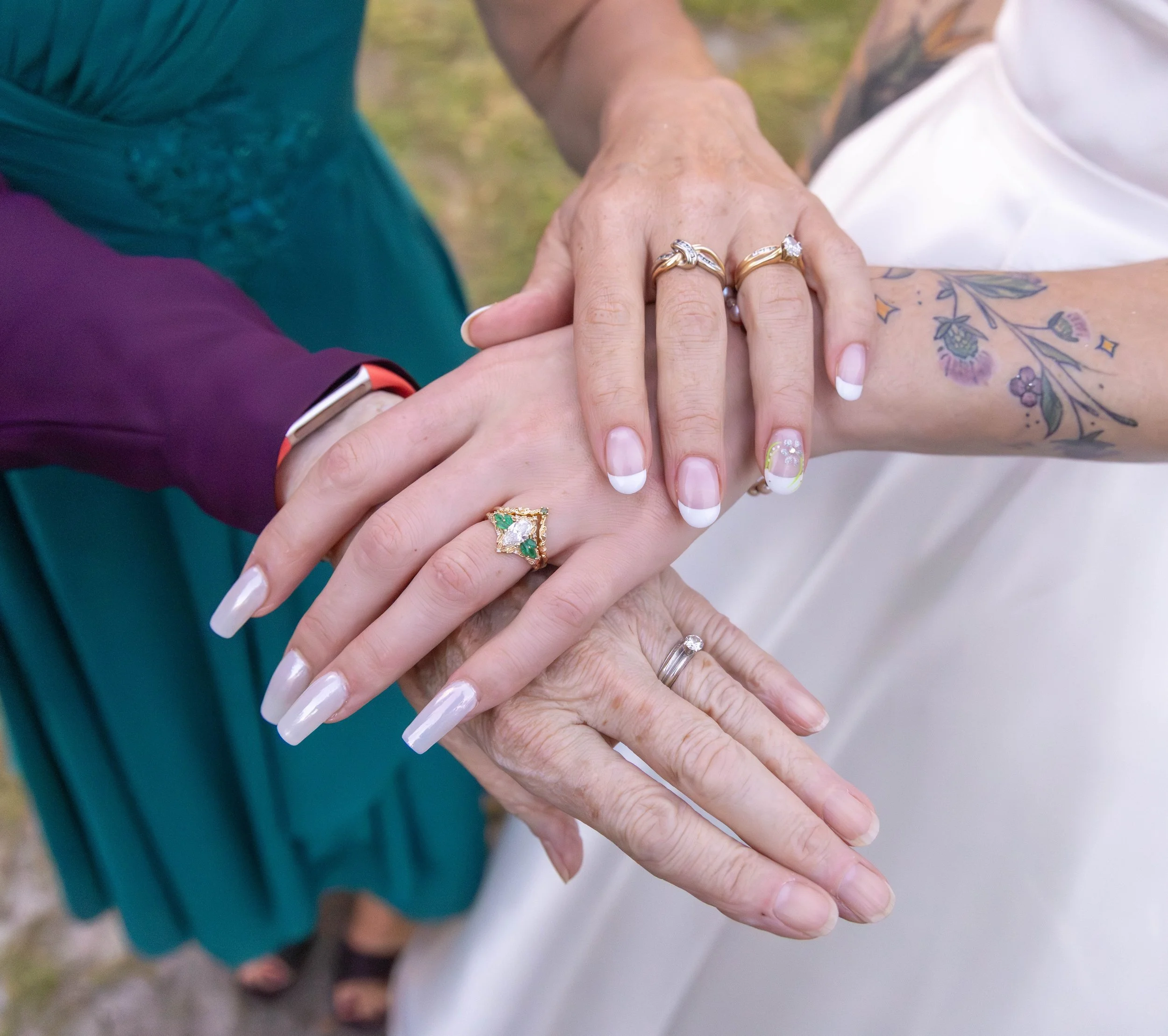 Generational wedding ring detail photographed in a candid documentary style. 