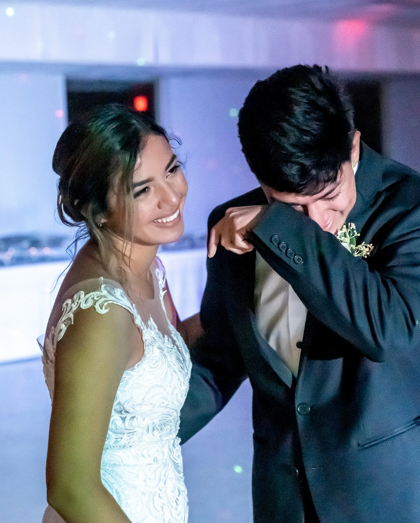Bride and brother sharing an emotional moment during the wedding day. 