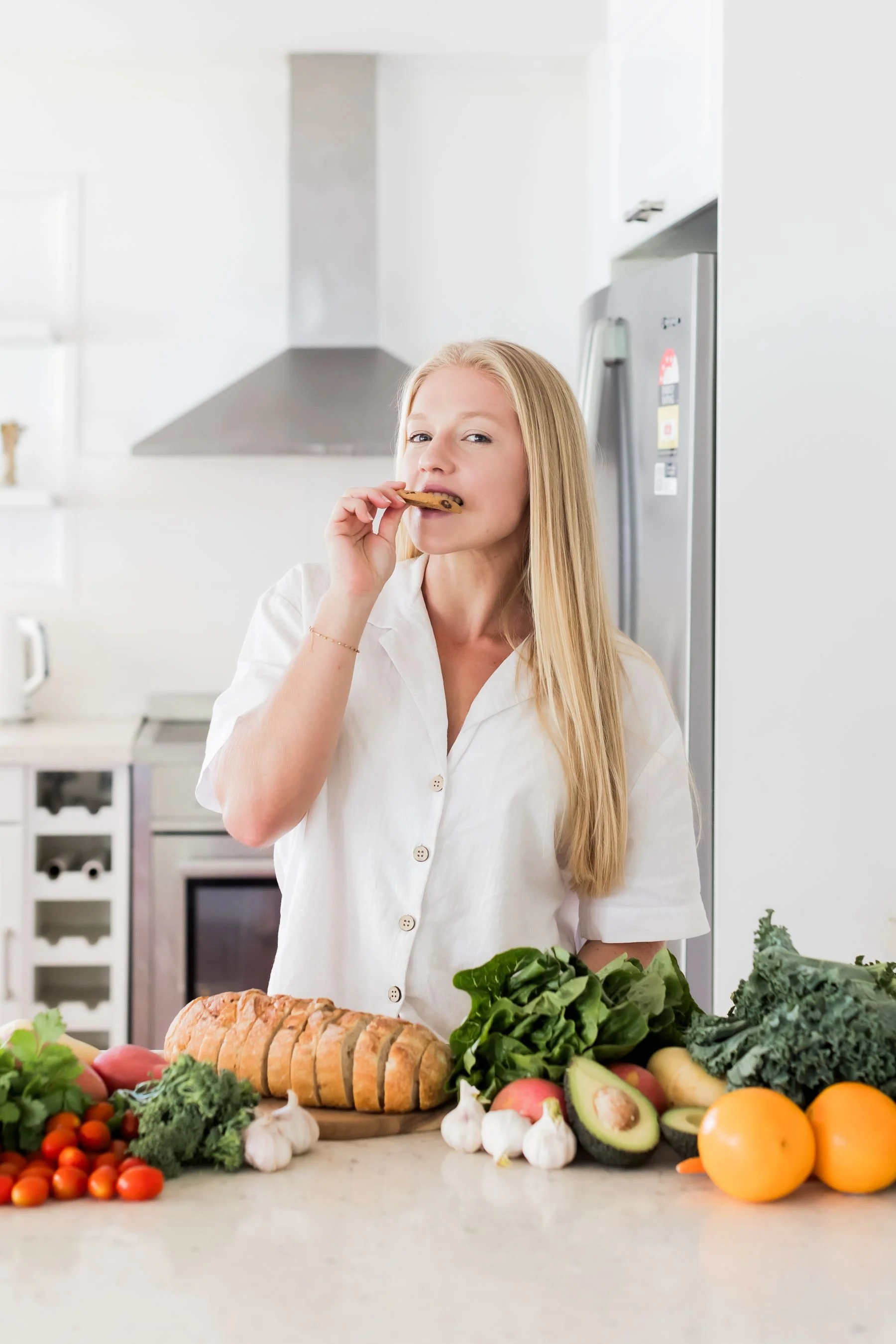 sunshine coast dietitian women eating cookie