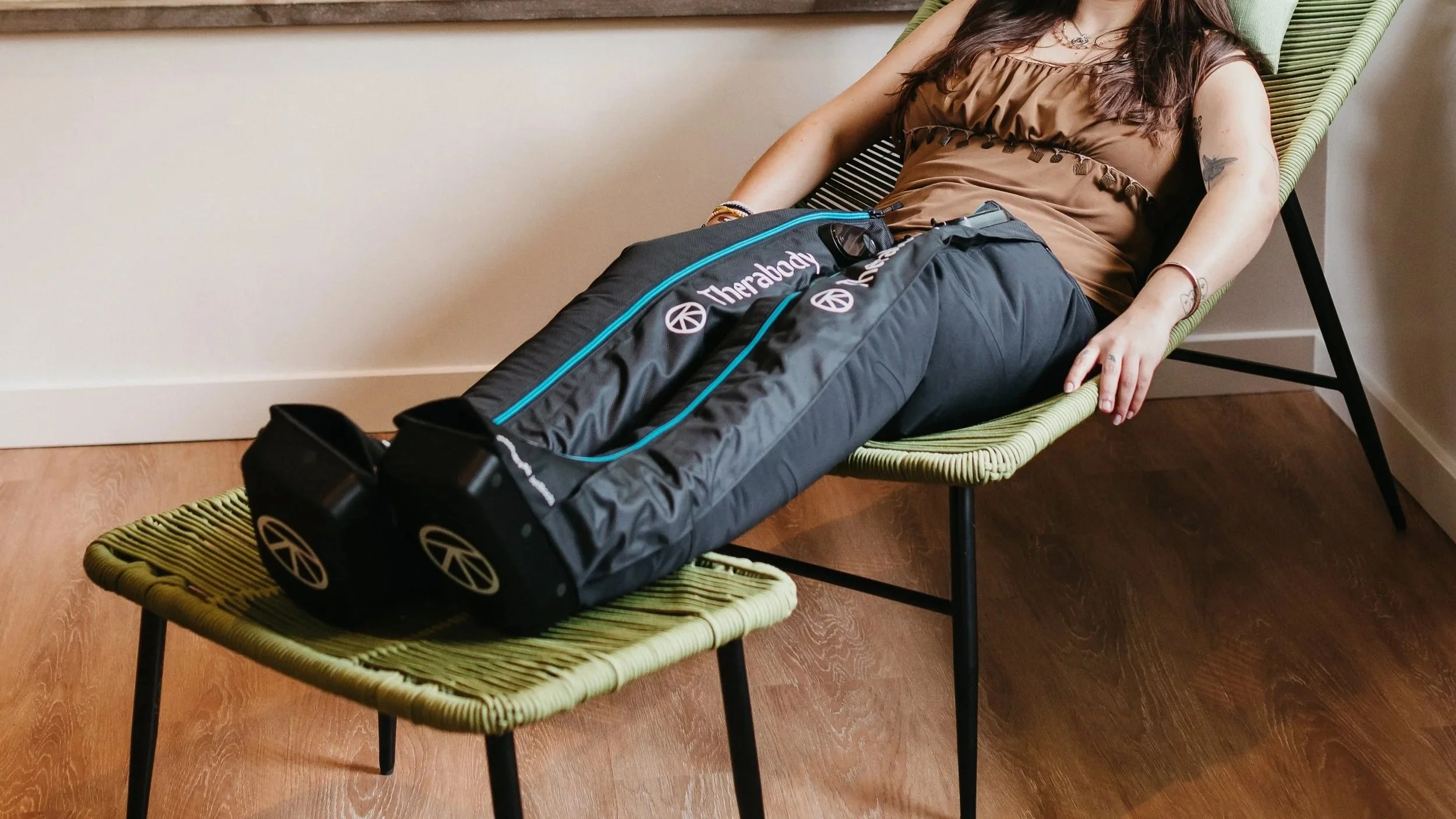 Woman with compression boots on.