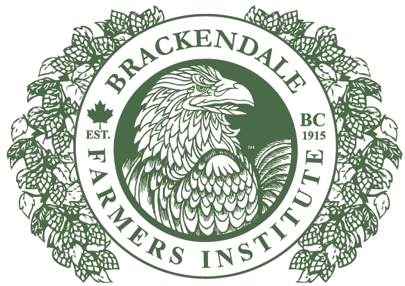 Logo for Brackendale Farmers Institute featuring a detailed eagle head inside a circular emblem surrounded by hop leaves and cones.