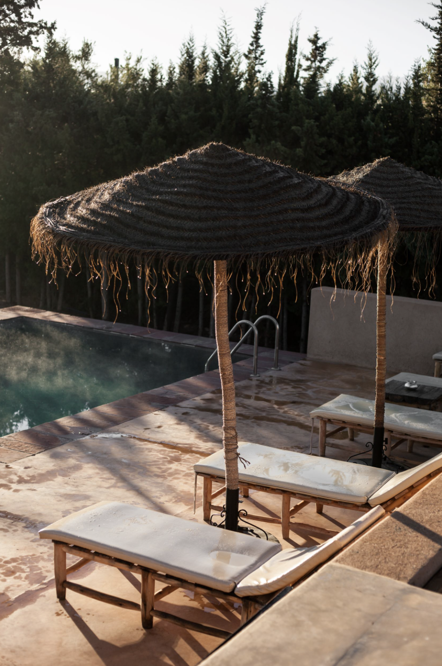 sun chairs by the pool