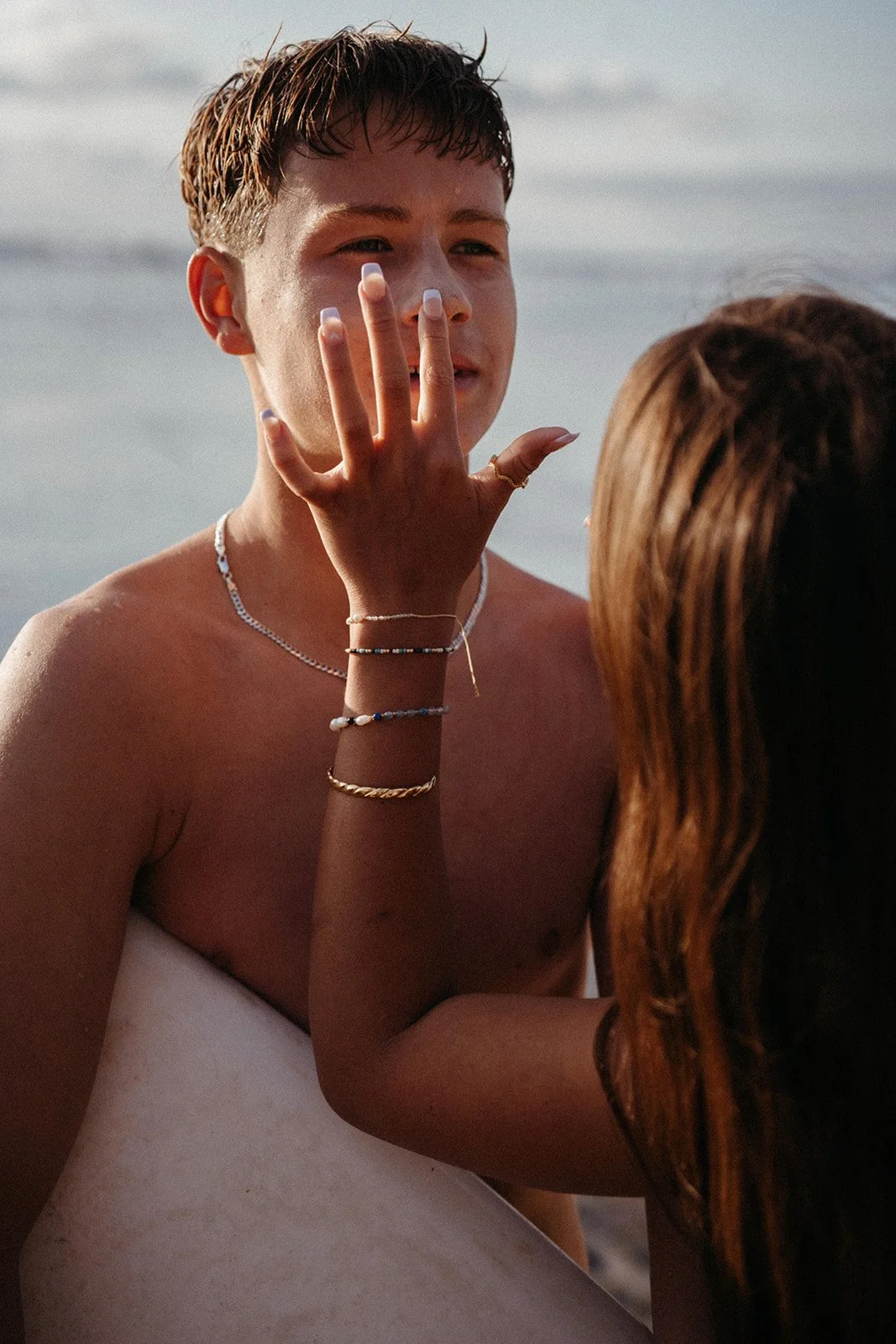 Yallingup Zinc being applied to a surfers face before entering the ocean