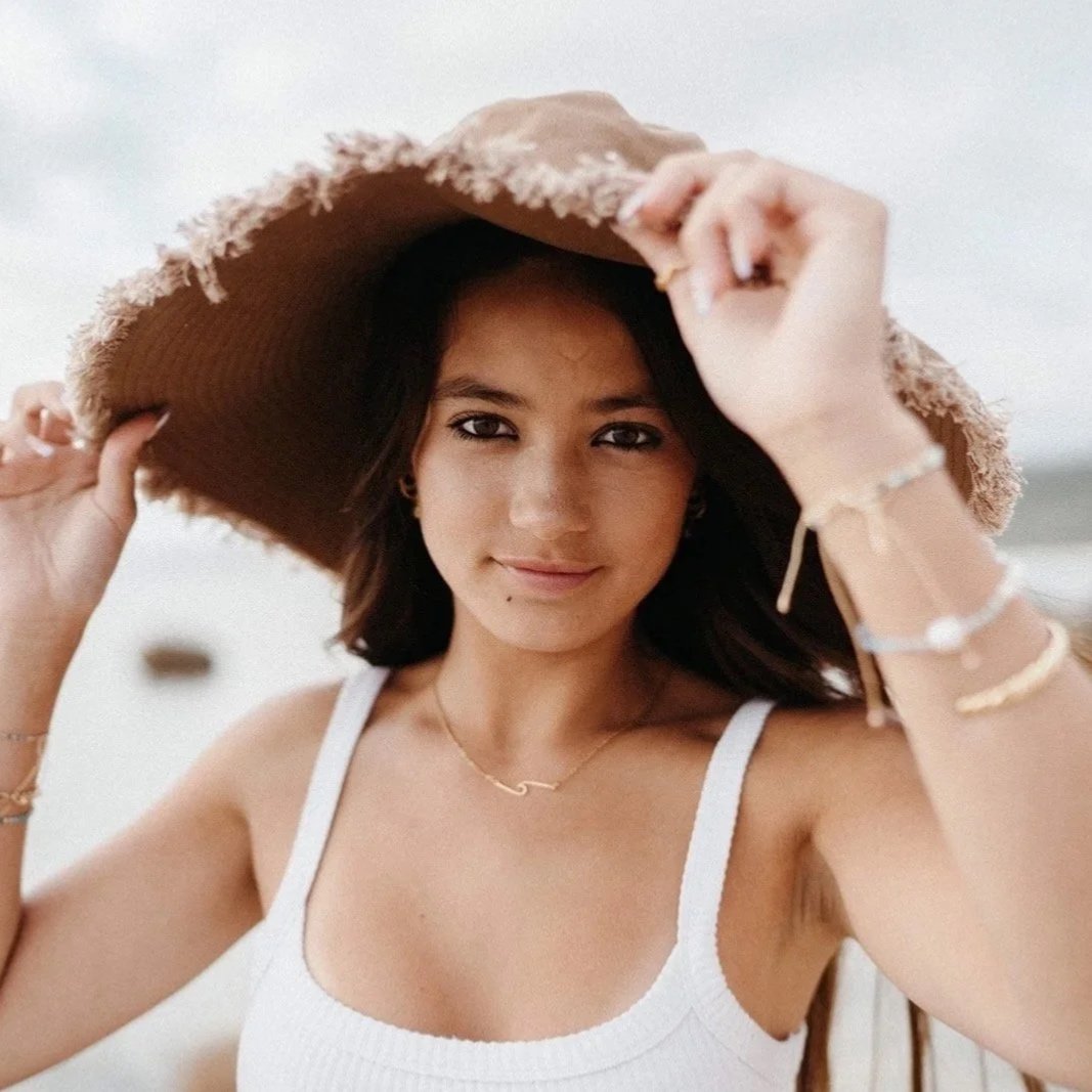 Beachside model with fresh, glowing skin after cleansing with Yallingup Zinc’s all-natural face oil – ideal for removing zinc and rebalancing skin