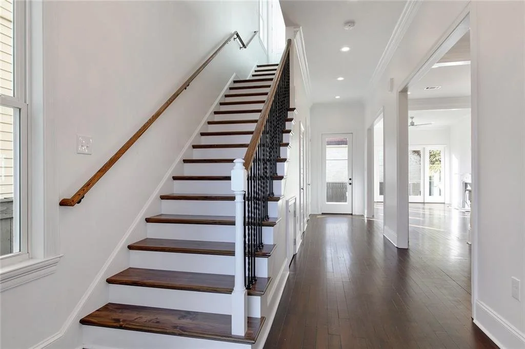 When your stairs make a statement 🤩 

Asper added some character and warmth with hardwood floors and trim accents in this beautiful blank canvas of our Milan project! 

#builtforliving #asper #construction #neworleans #nolahomes #millwork #staircase