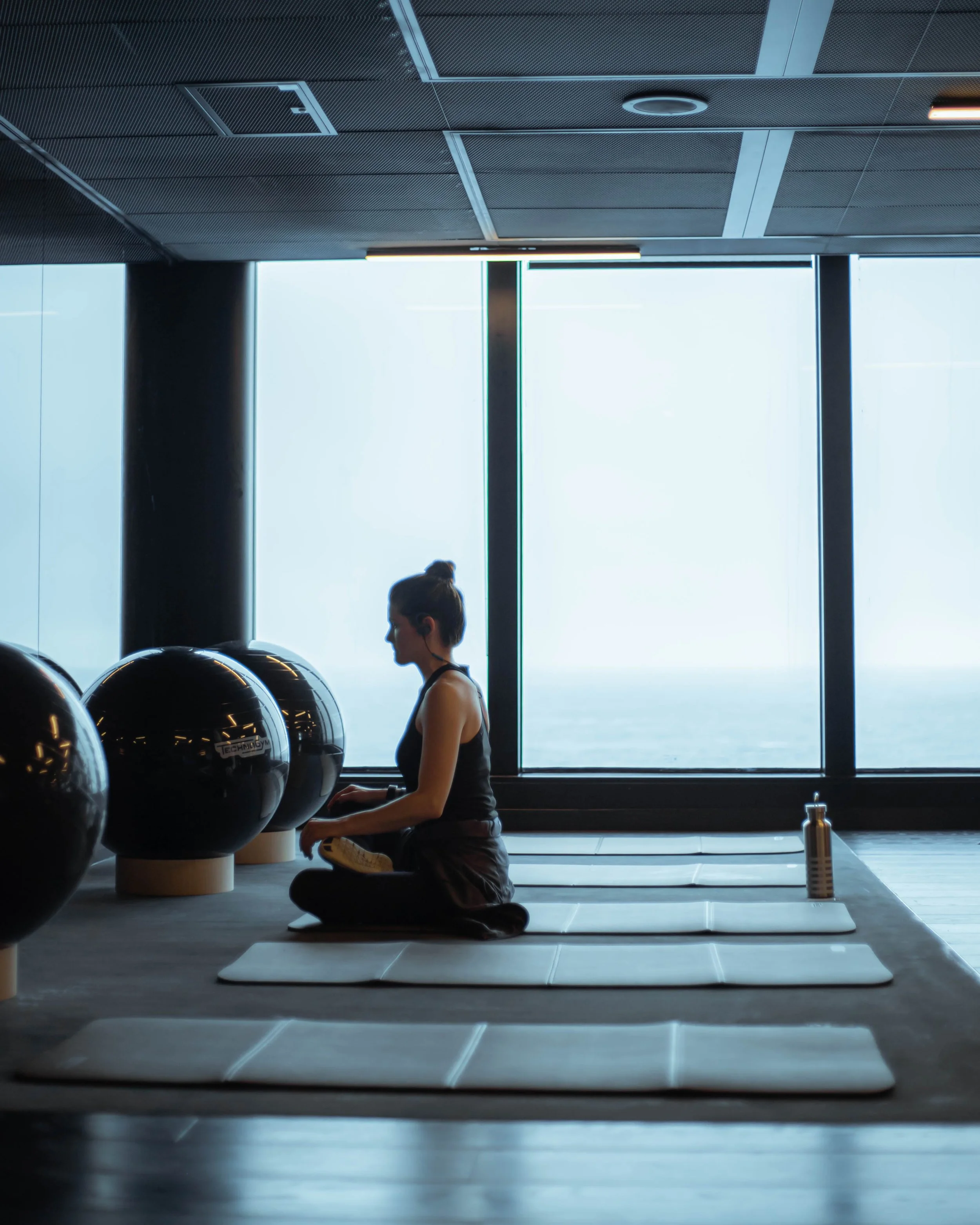 IMG-WEL-Woman-Meditating-Windows-ginajoyphoto.jpg