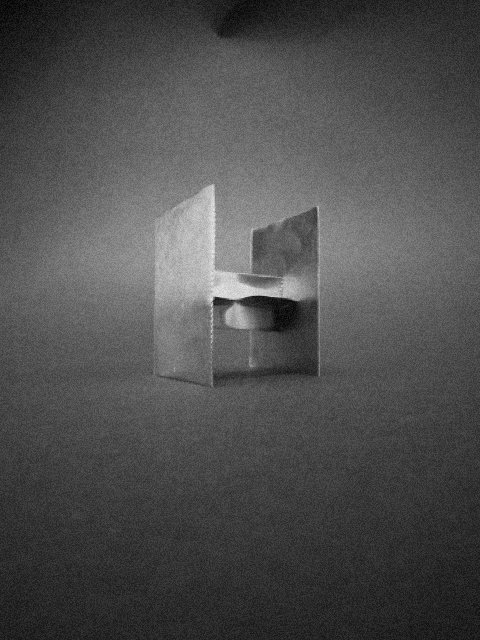 A black and white photo of a geometric abstract sculpture with vertical and horizontal planes.