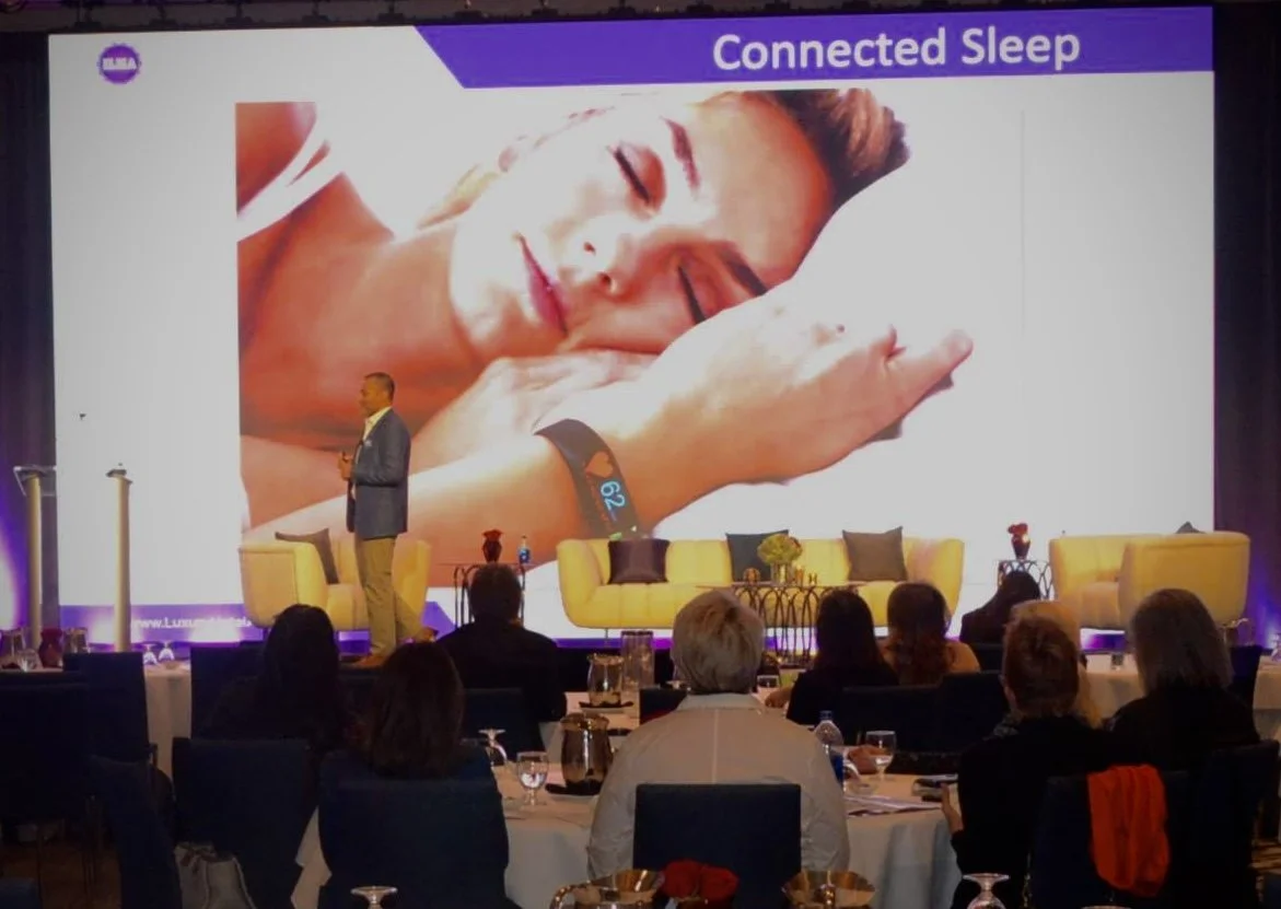Sleep expert JD Velilla speaking at a corporate wellness event about improving sleep and performance
