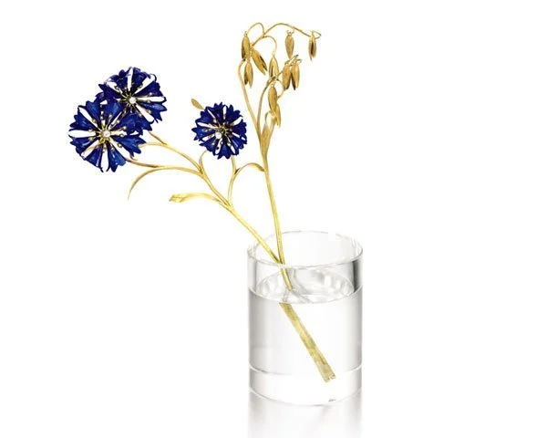 Blue enamel and yellow gold cornflower in a rock crystal vase